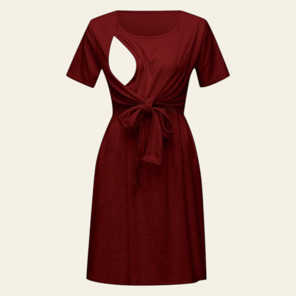 Red short sleeve casual dress with back cutout displayed flat on a white background