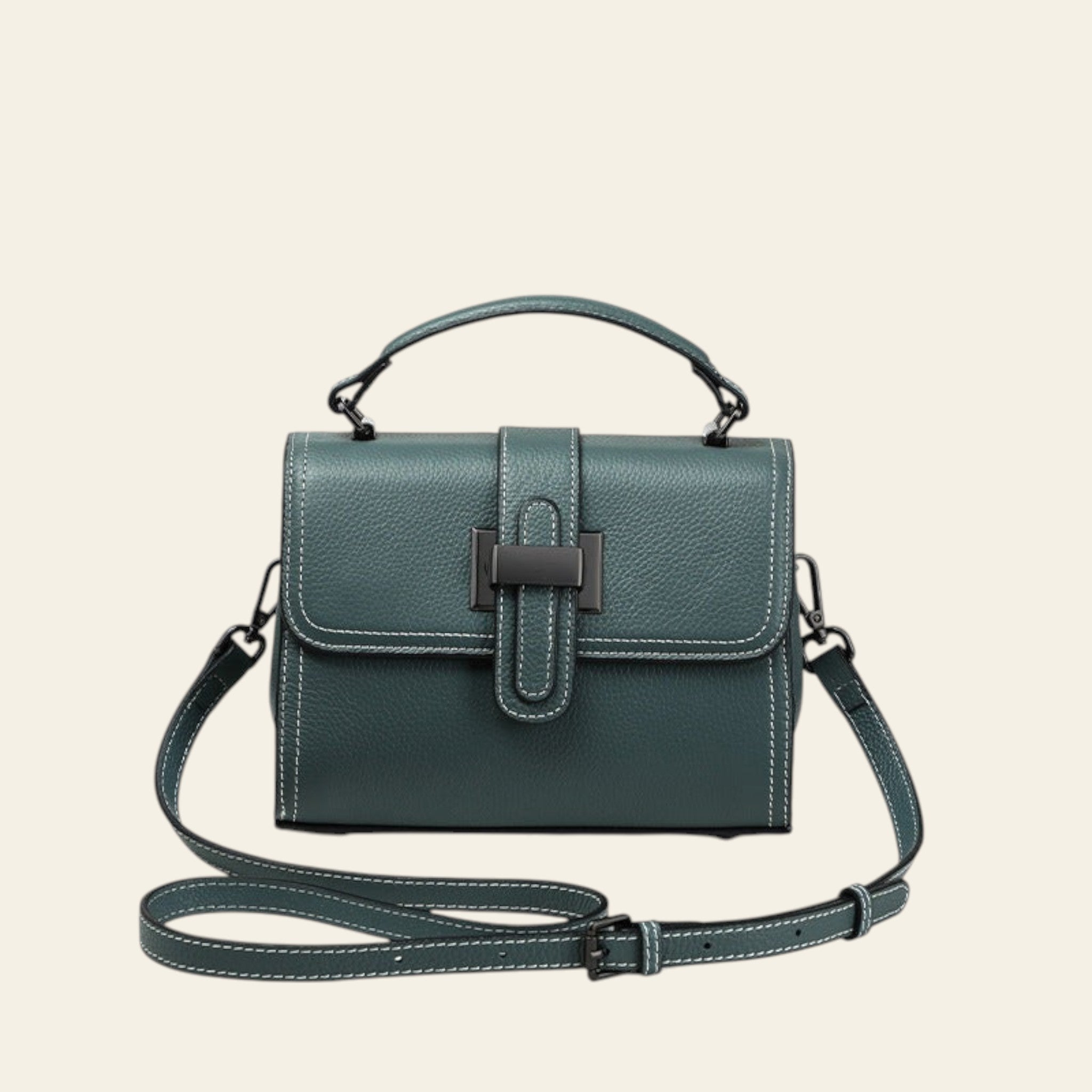 Green handbag with a strap on a white background