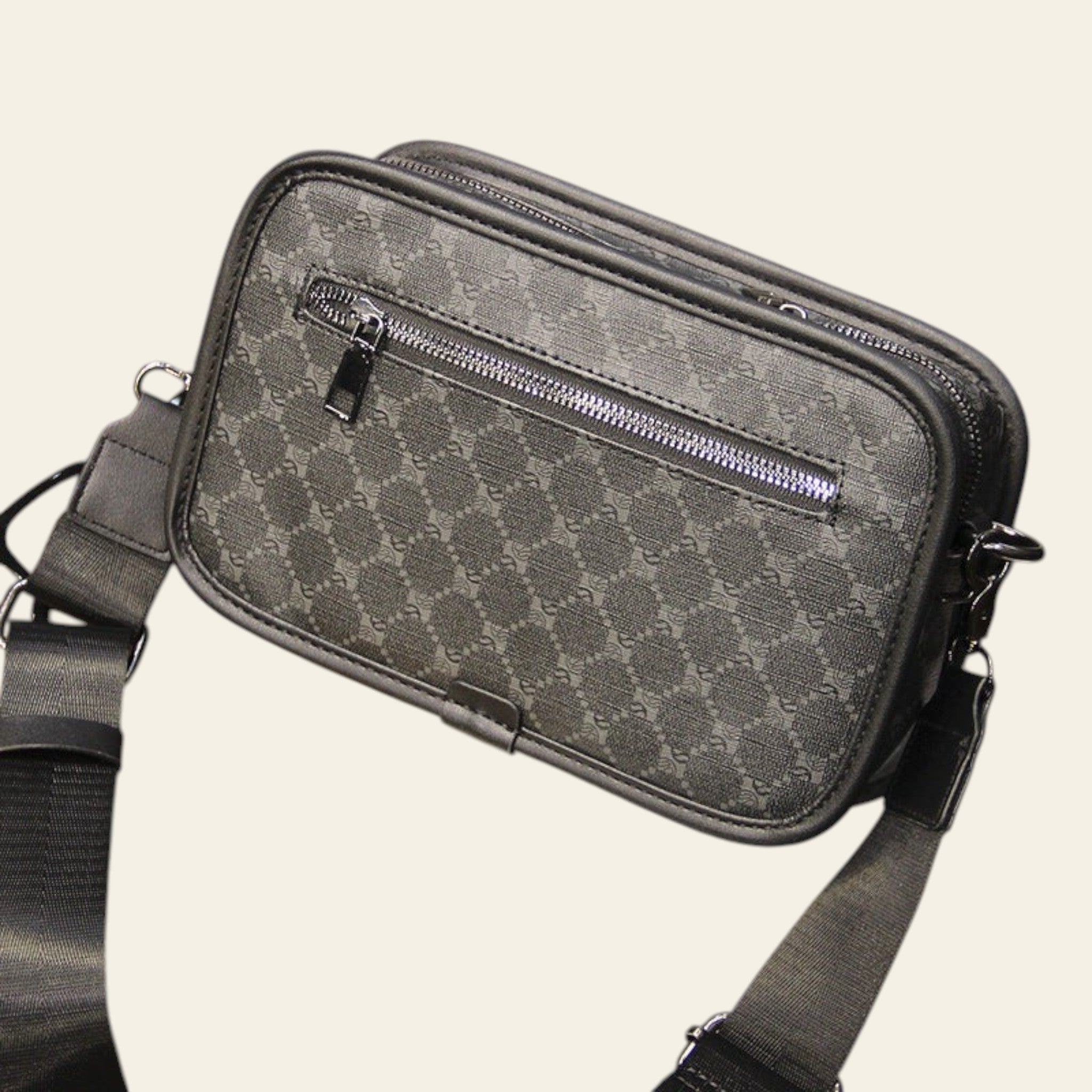 Gray patterned shoulder bag on a wooden table