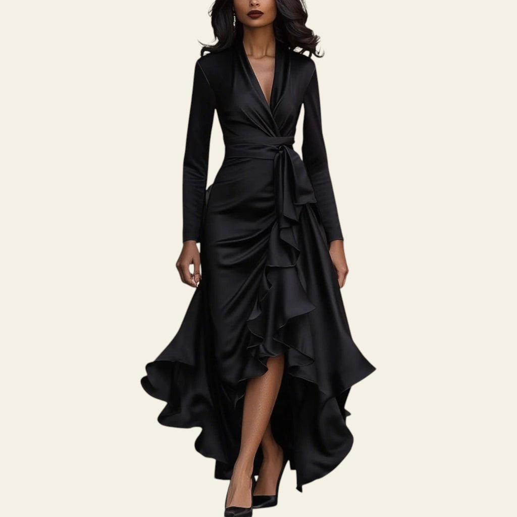 Woman wearing a black satin V-neck ruffled hem dress walking on a city street