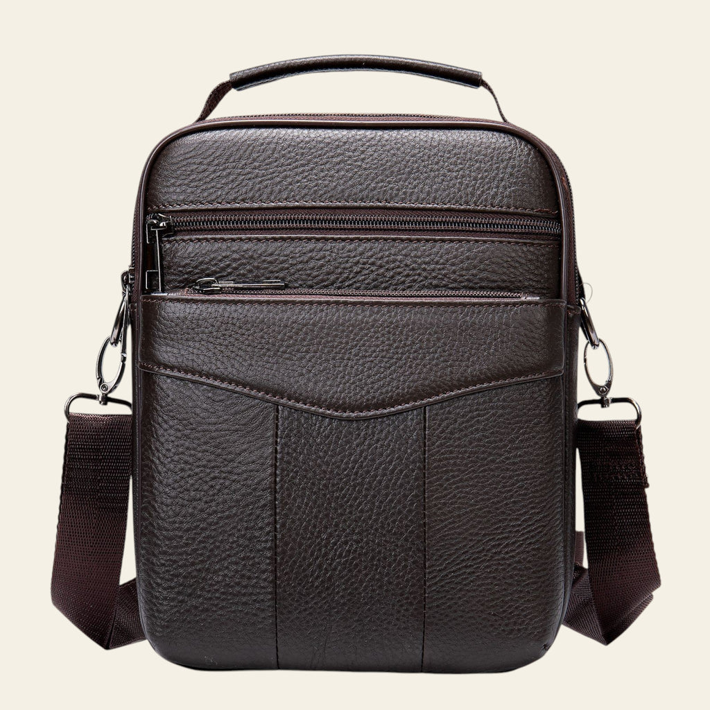 Brown leather crossbody bag on a white background