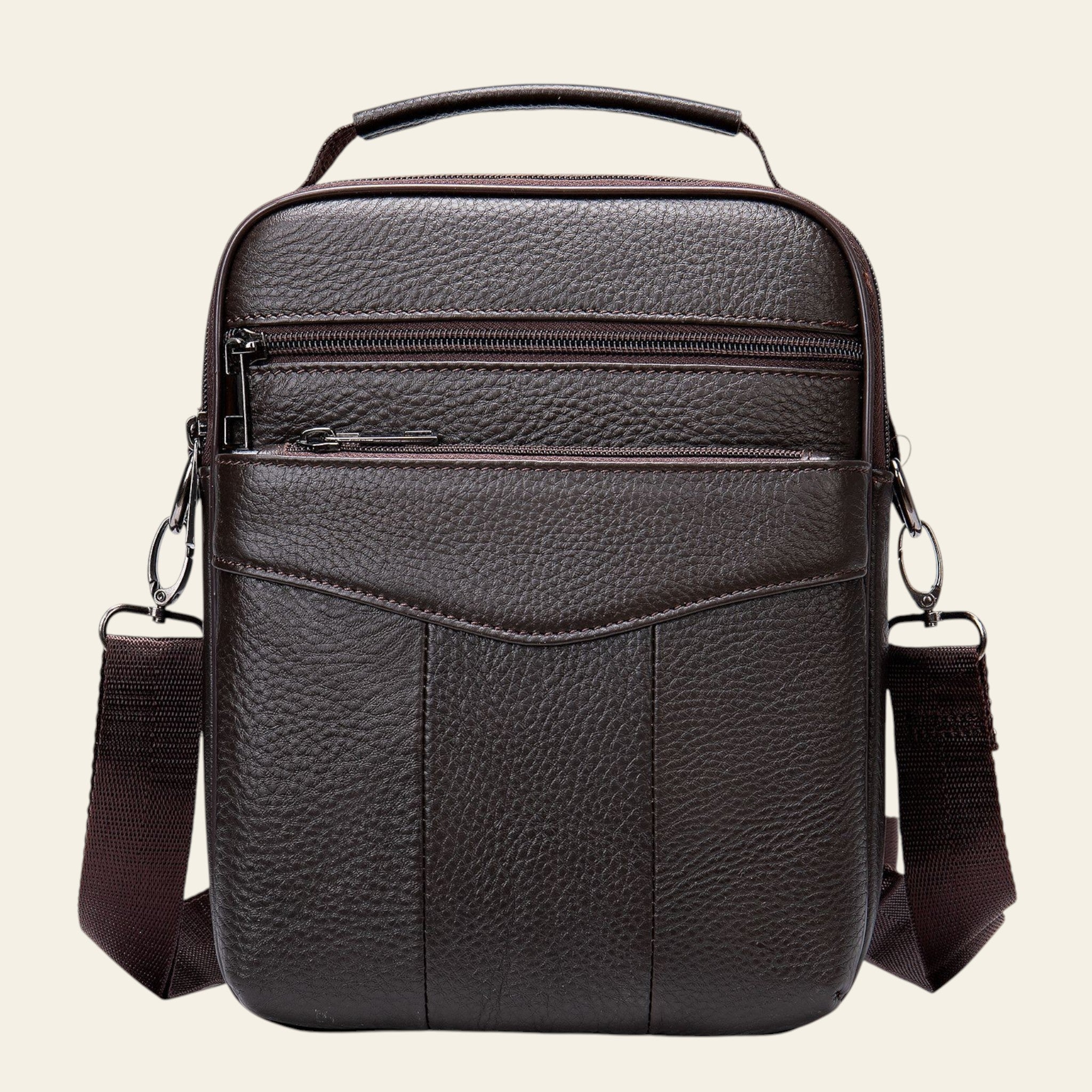 Brown leather crossbody bag on a white background