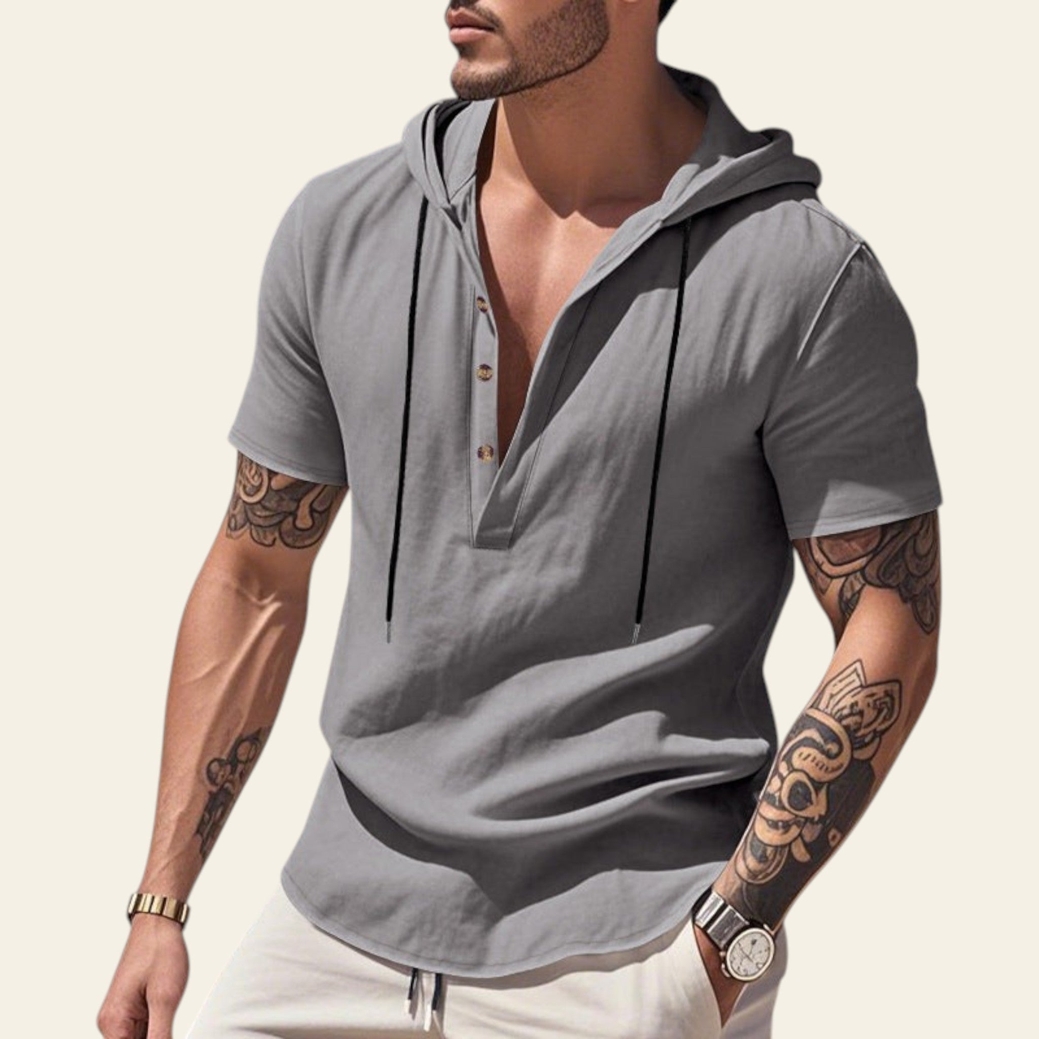 Man wearing a Light gray breathable linen hooded short sleeve henley shirt at the beach