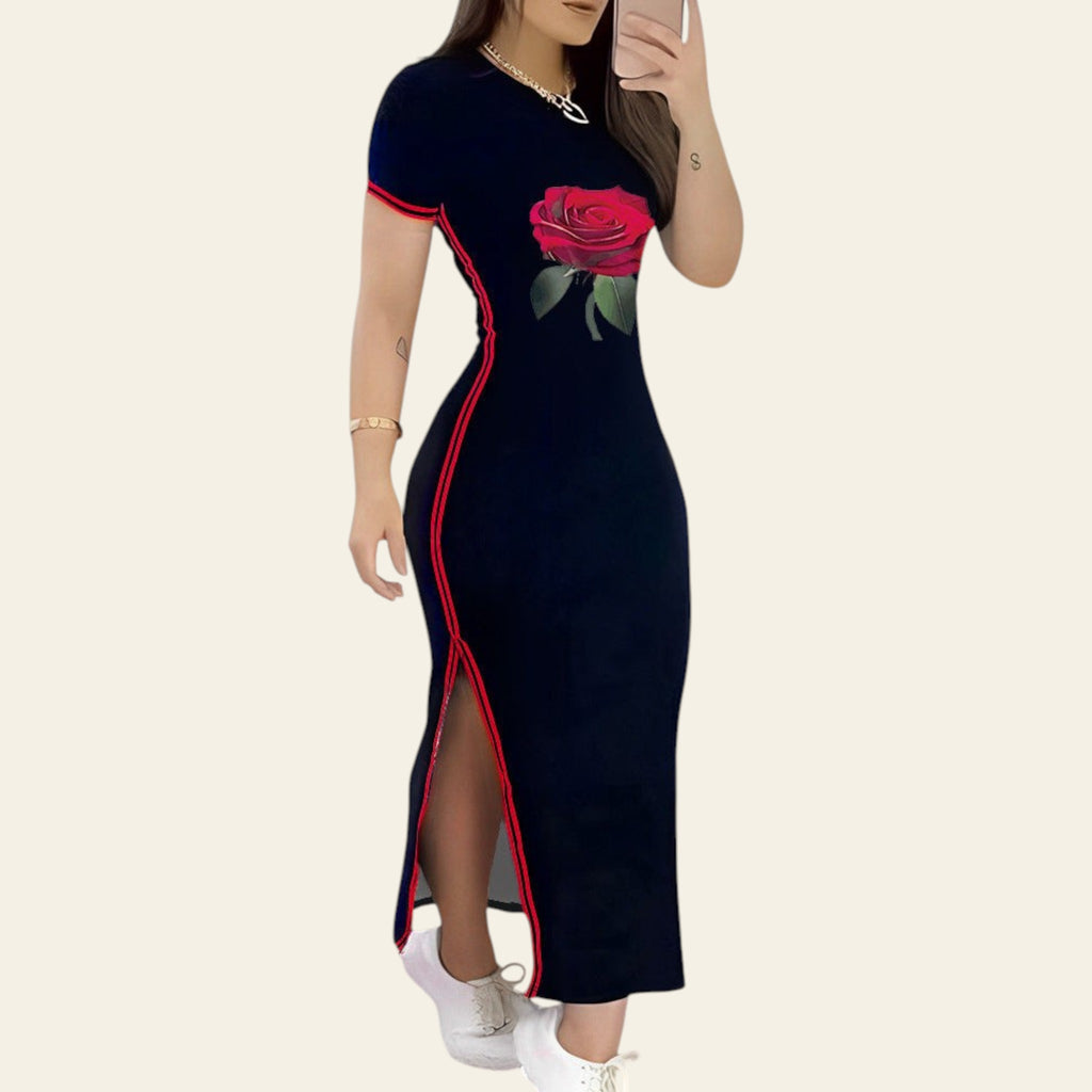 Black maxi dress with red rose detail and side slit on a woman
