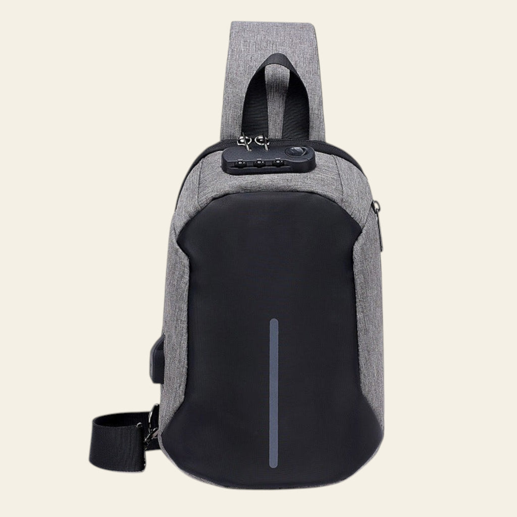 Gray and black crossbody bag on a white background