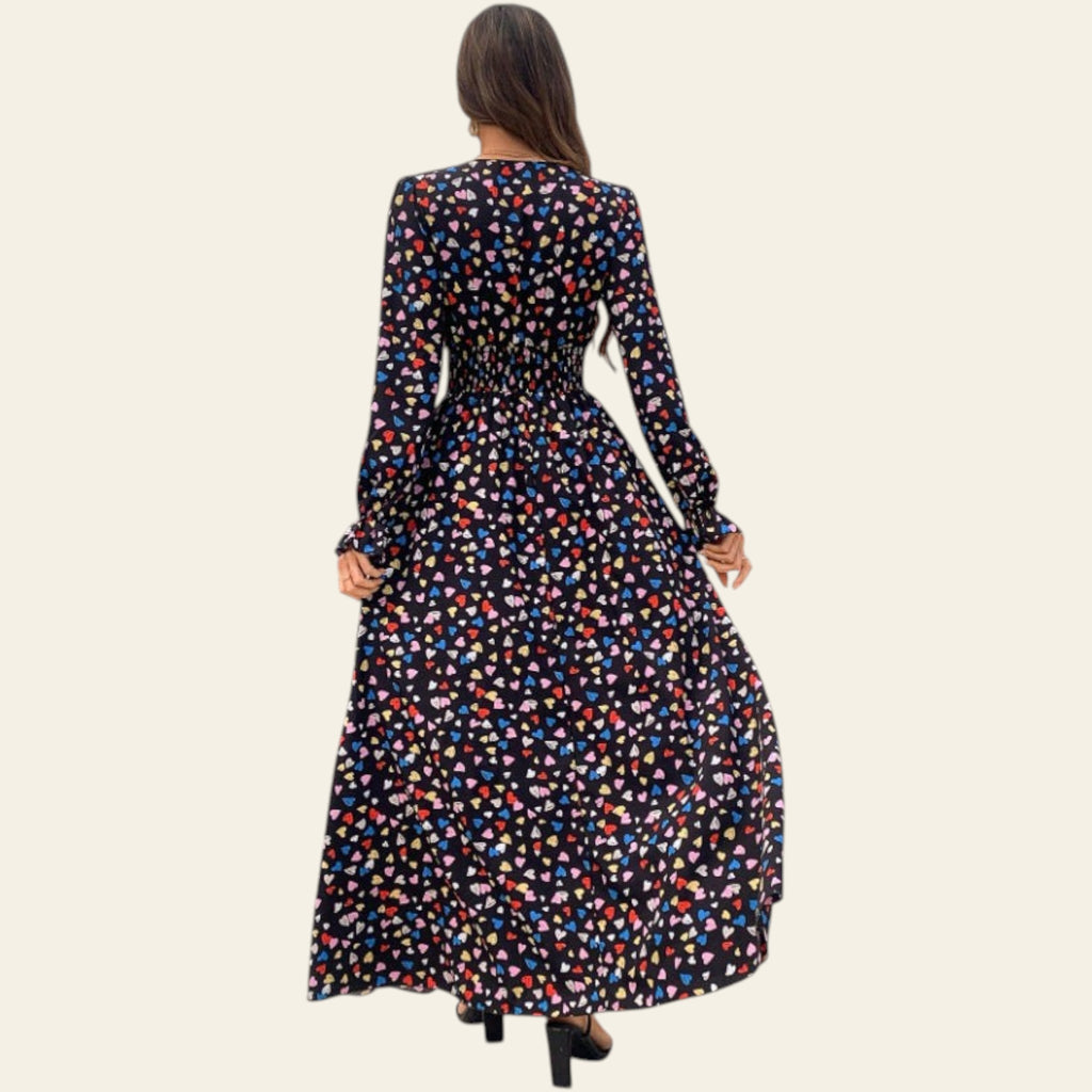 Back view of women's long sleeve floral maxi dress