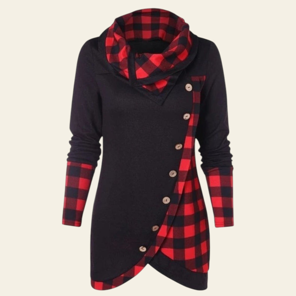 Black dress with red plaid accents and buttons on a white background