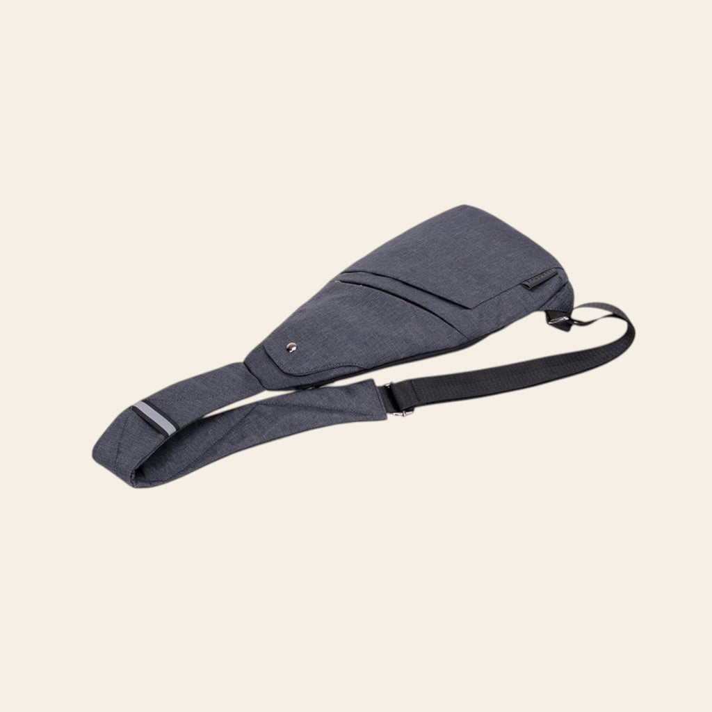 Gray waist bag with a strap on a white background