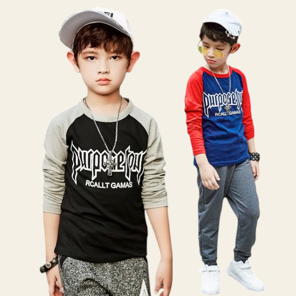 Two children wearing branded clothing with a dark background