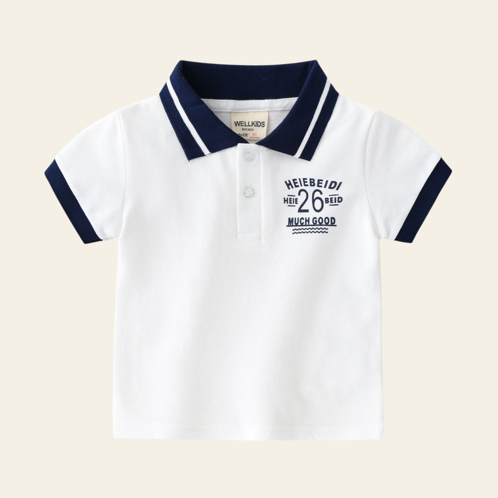 White polo shirt with navy accents and text on a light gray background