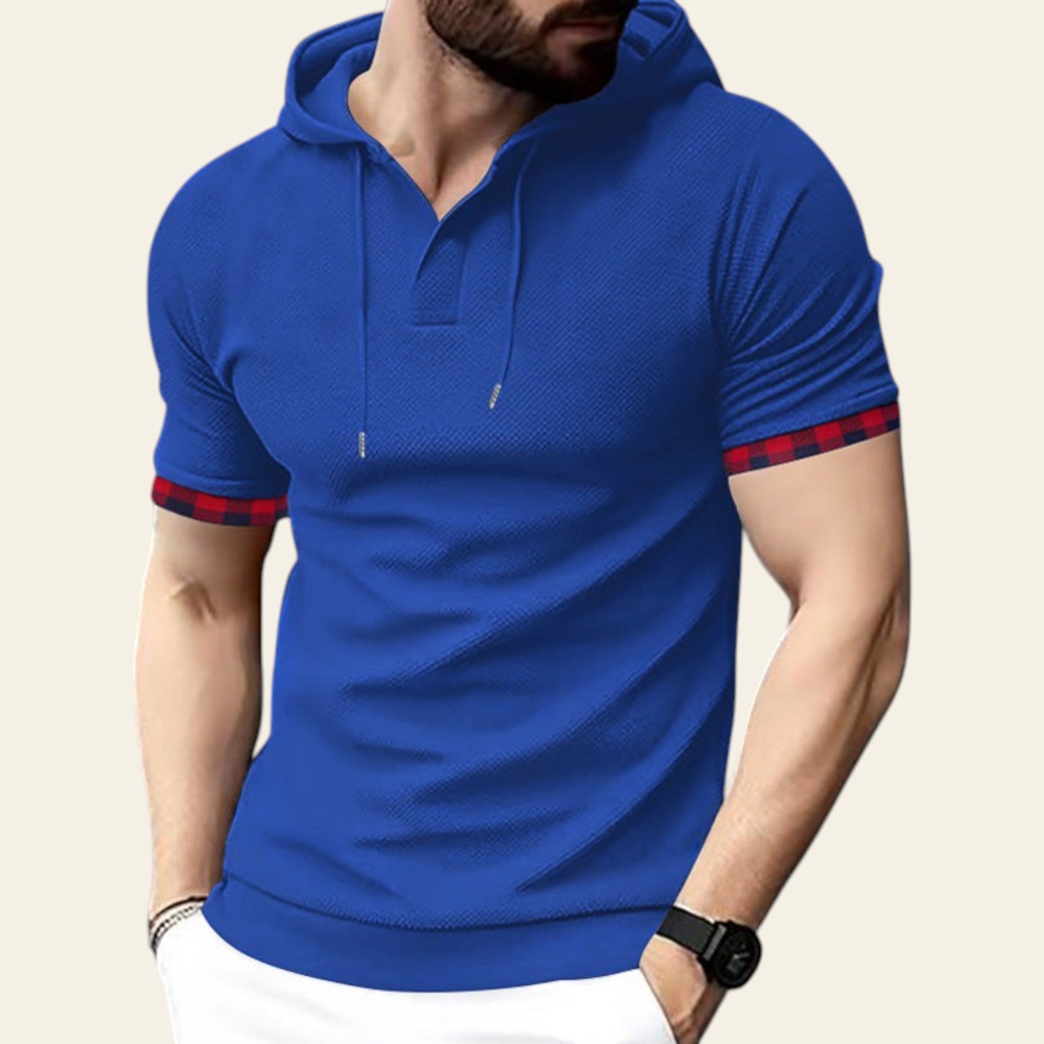 Man wearing a sapphire blue short sleeve hoodie t-shirt with sporty look