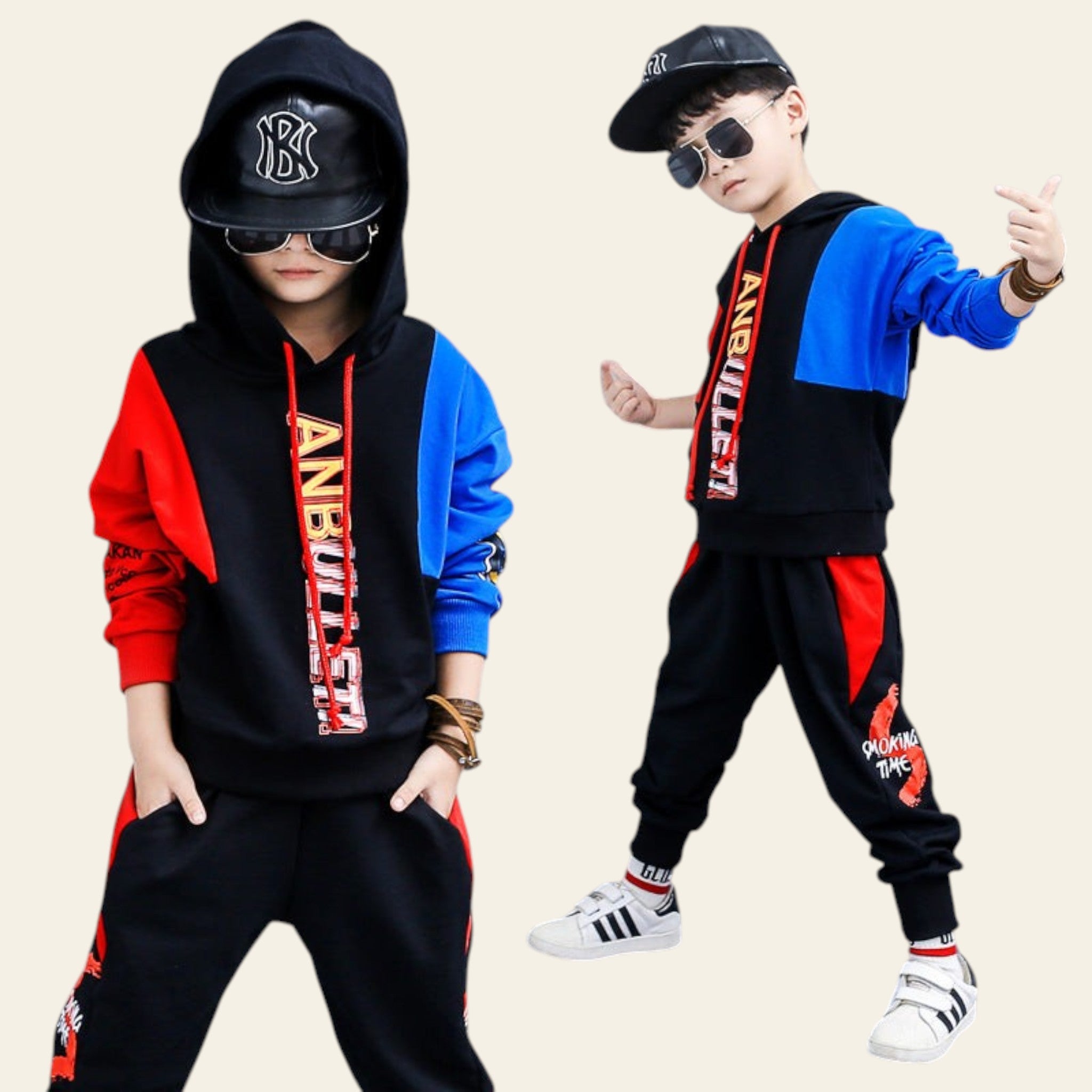 Two children in stylish outfits with colorful jackets and caps, posing against a gray background.
