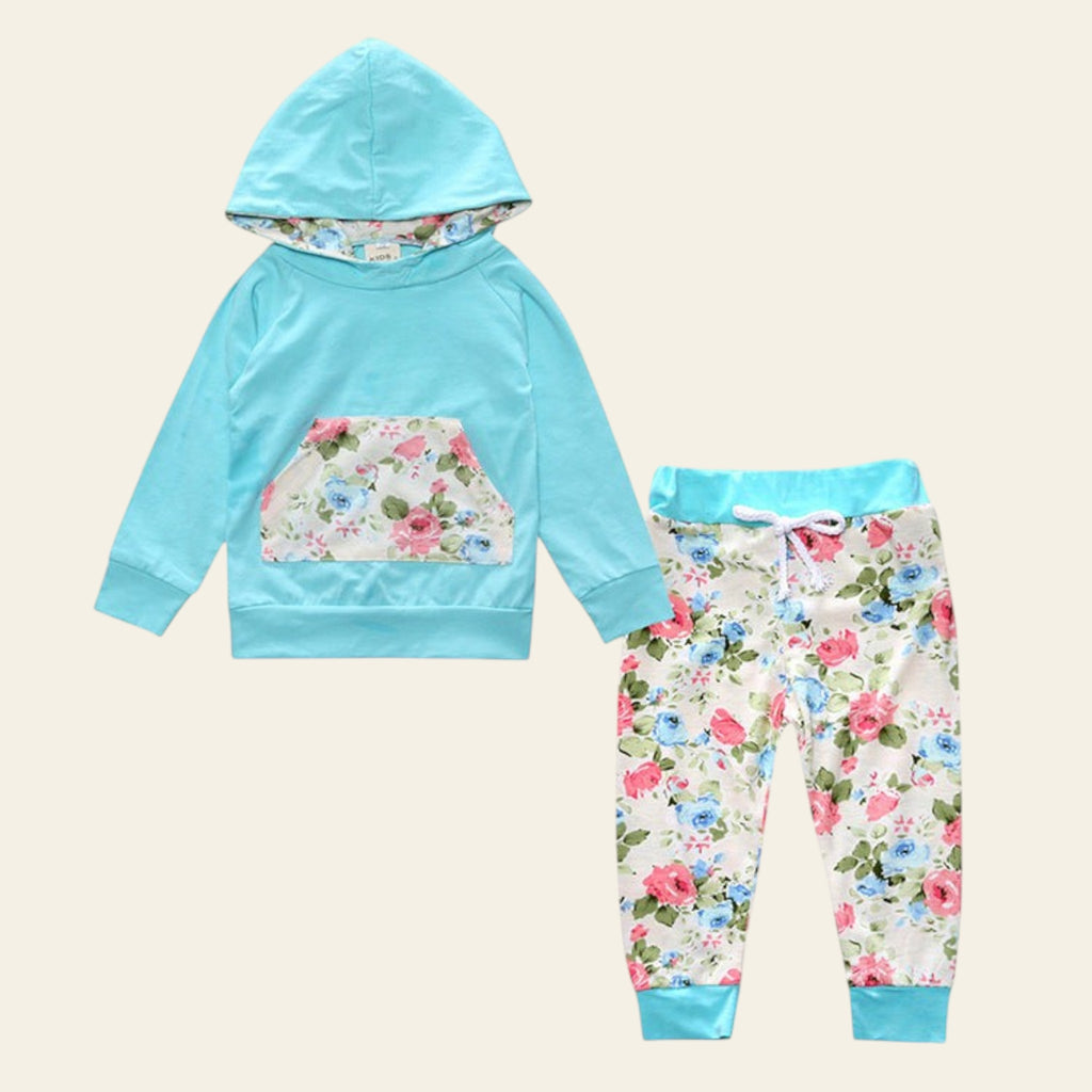 Children's floral hoodie and pants set on a white background