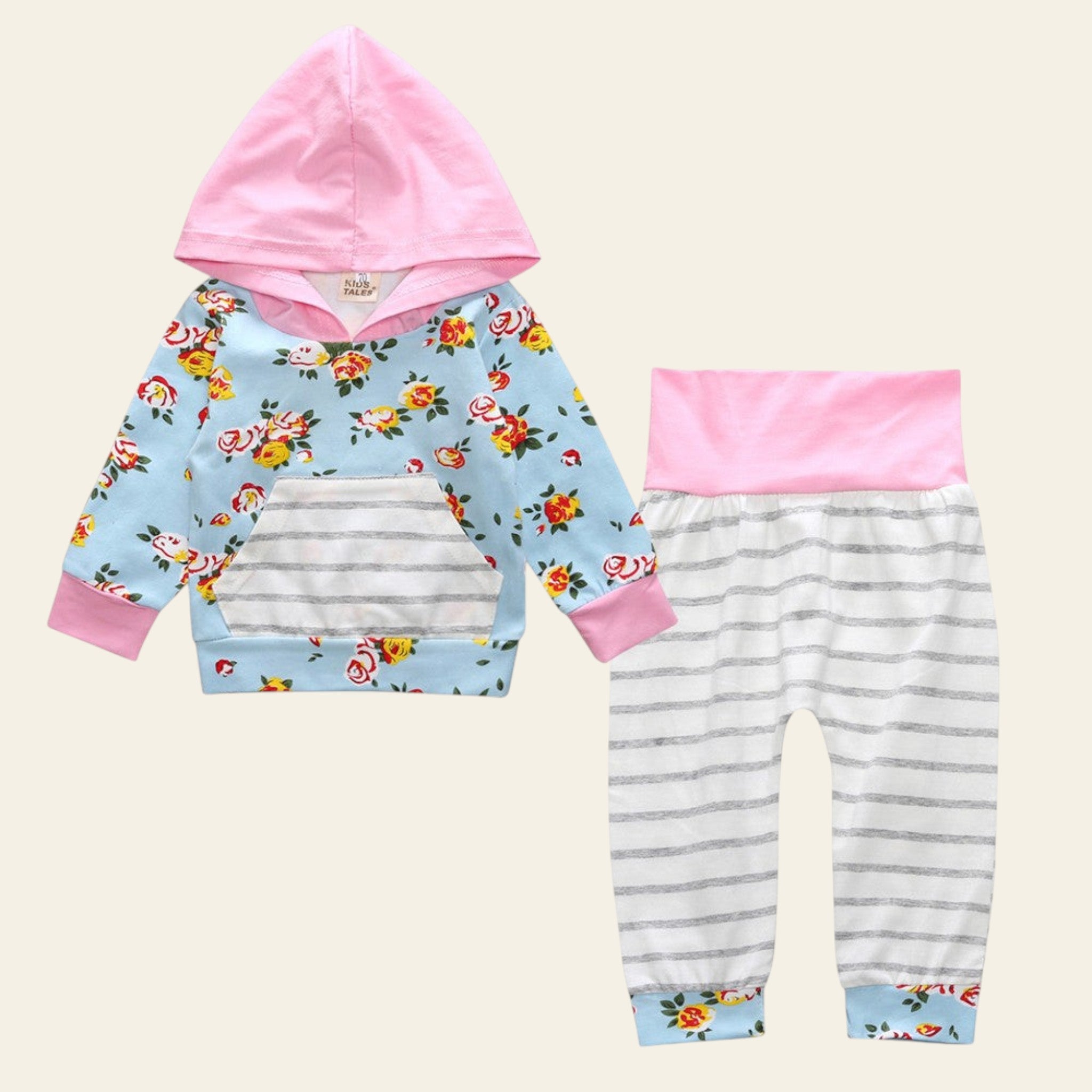 Children's hoodie and pants set with floral pattern on a white background