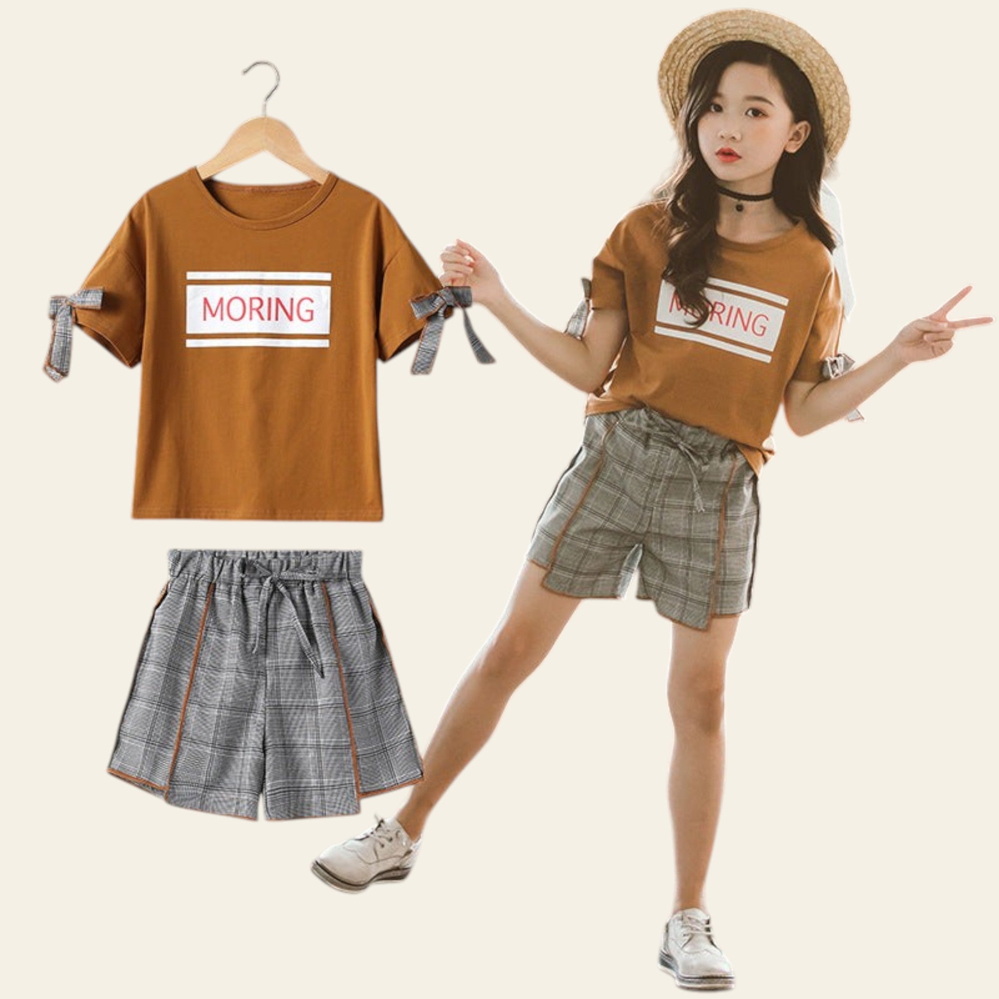 Woman wearing a matching outfit with a 'MORING' t-shirt and plaid shorts, standing next to the outfit on a hanger.
