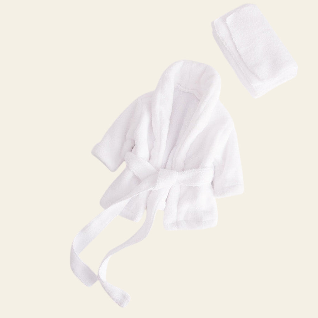 White satin bow on a light gray background