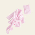Pink robe on a light gray background