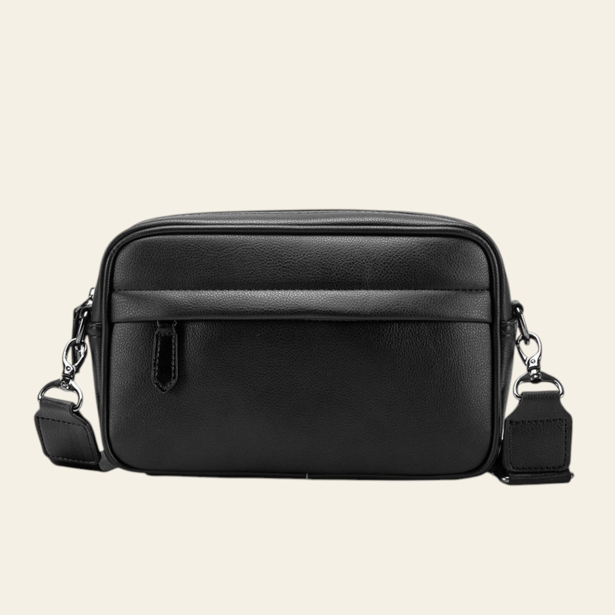 Black leather crossbody bag on a white background