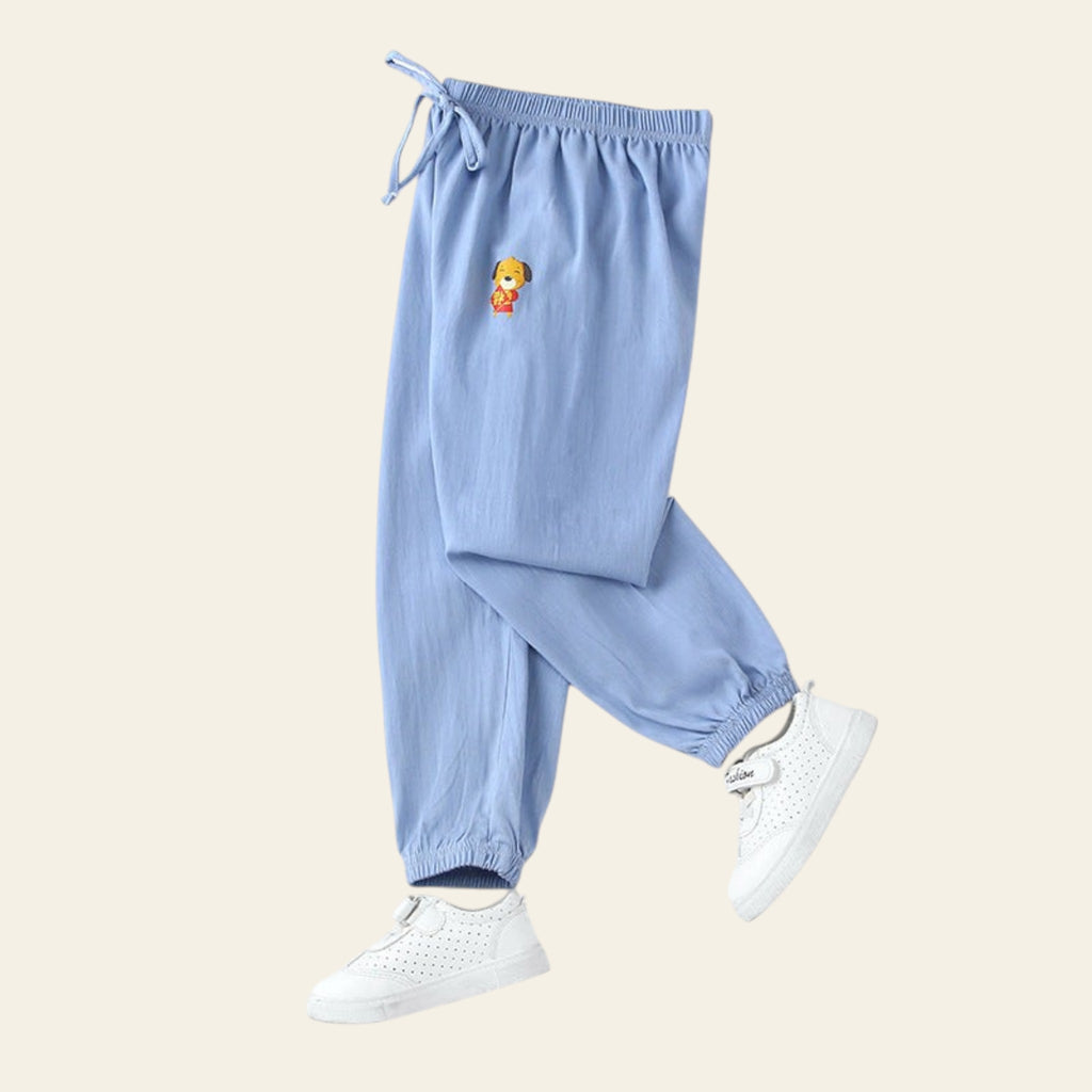 Light blue pants with a small embroidered design on a white background
