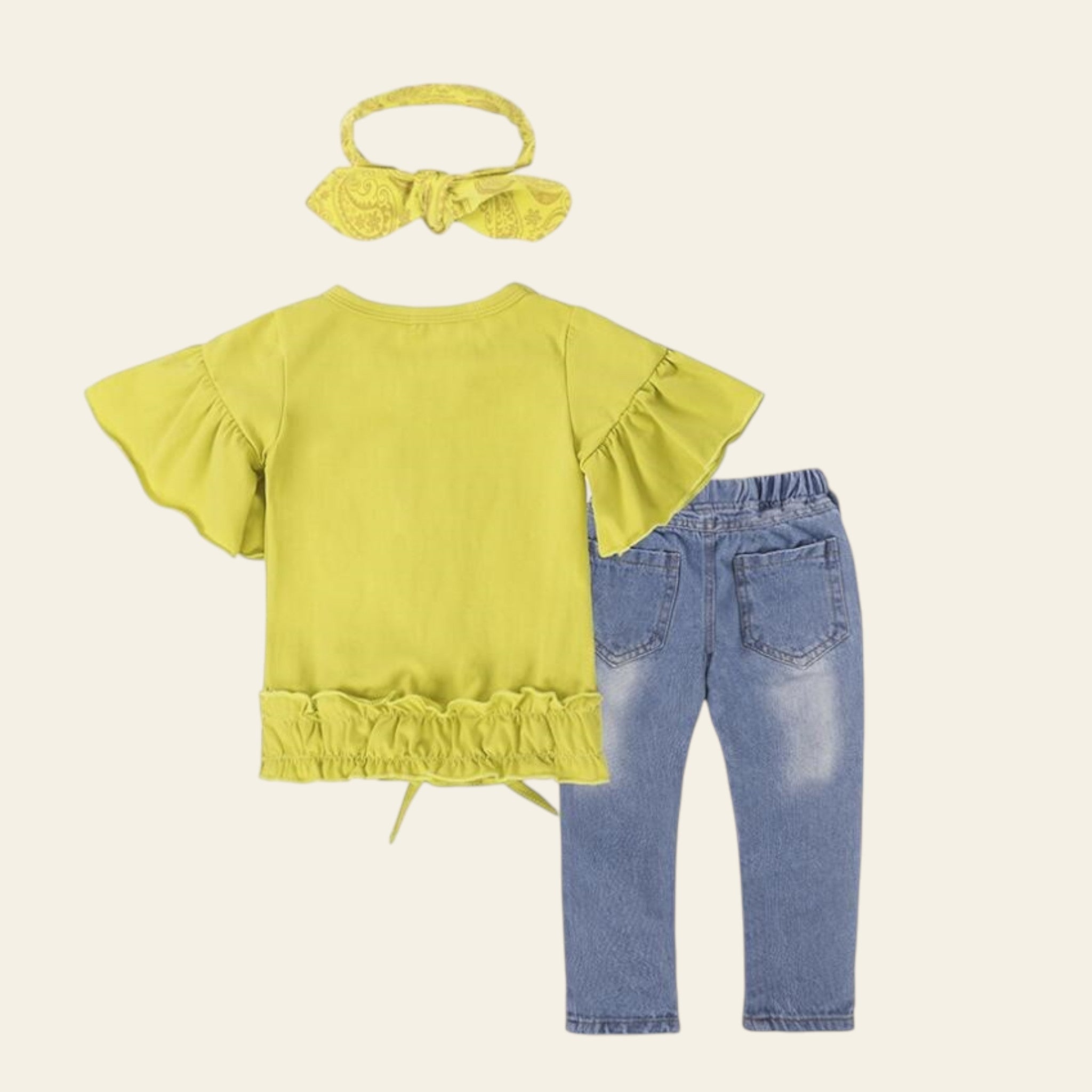 Yellow top with ruffled sleeves, blue jeans, and yellow headband on a white background