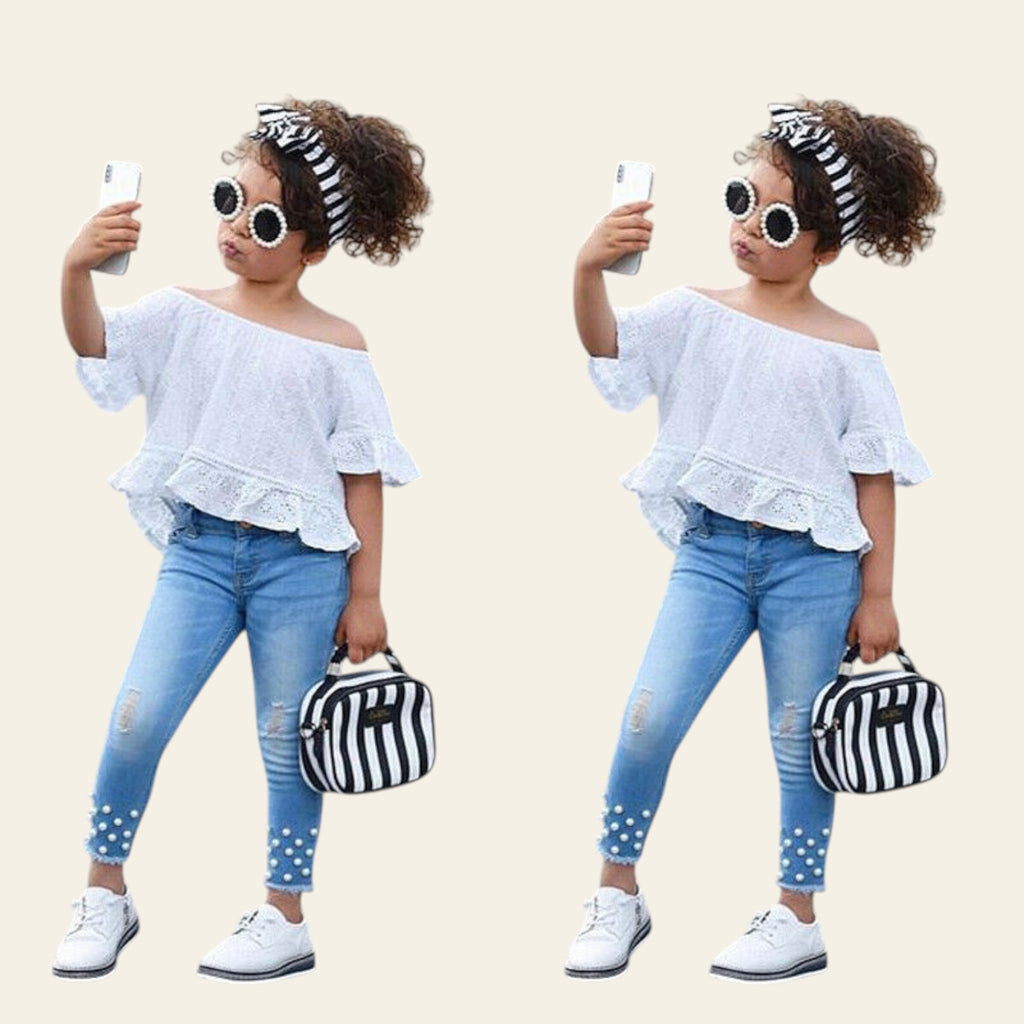 Two images of a young girl taking a selfie on a street, wearing a white off-shoulder top, blue jeans, and polka dot shoes.