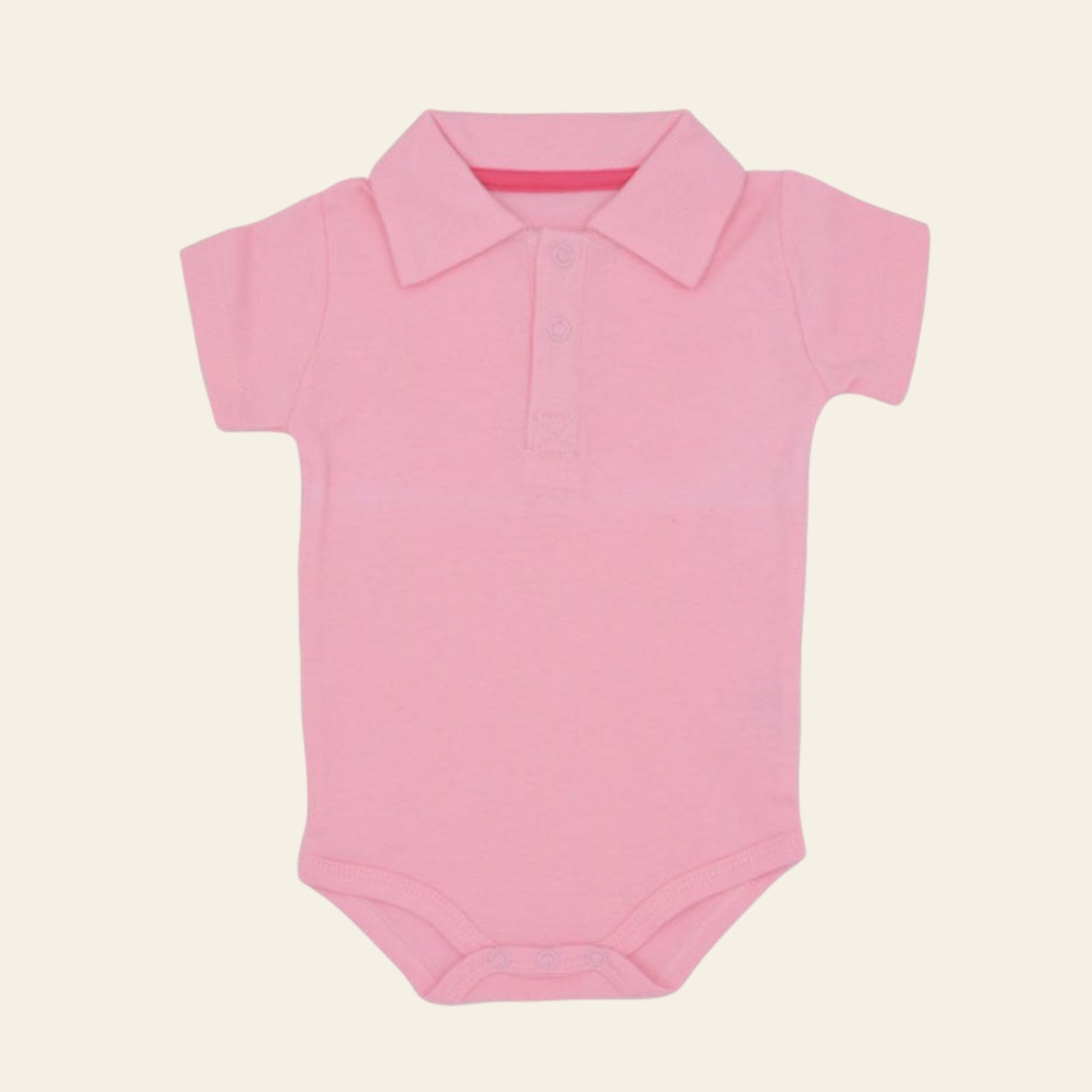 Pink baby onesie with collar on a white background