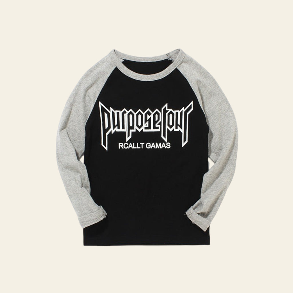 Black and gray baseball shirt with 'Purpose Tour' text on a white background