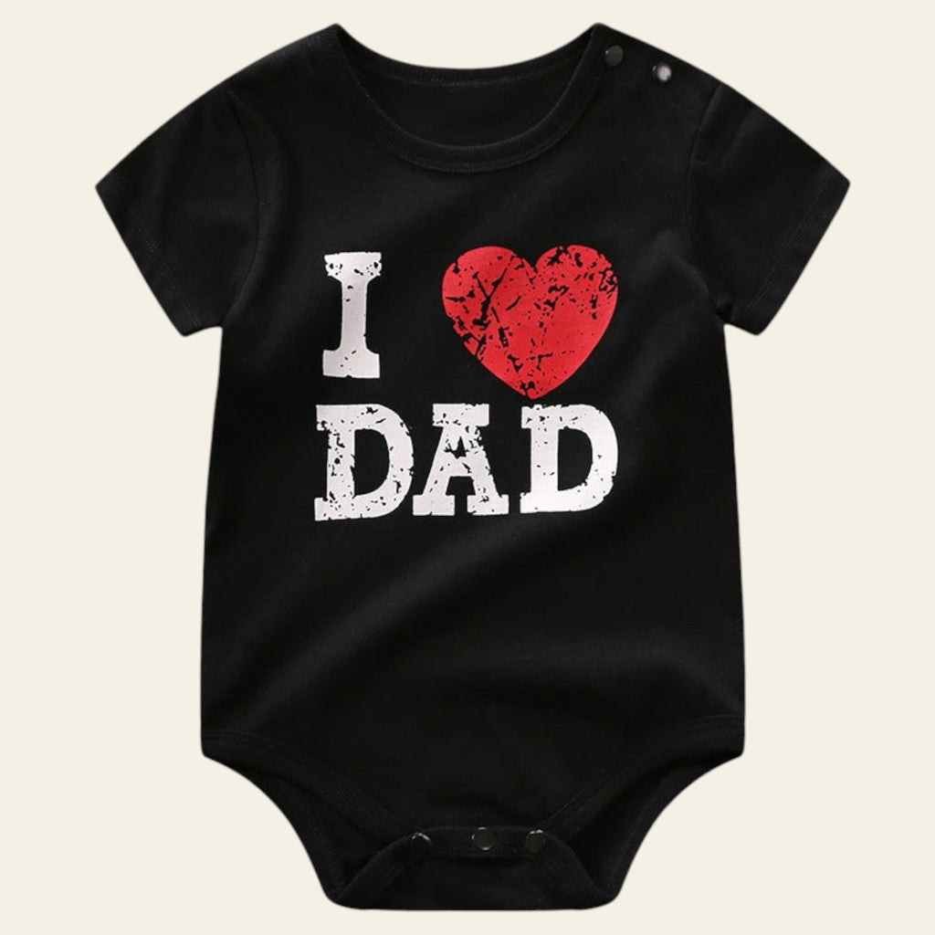 Black baby onesie with 'I ❤️ DAD' text on a white background