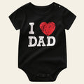 Black baby onesie with 'I ❤️ DAD' text on a white background