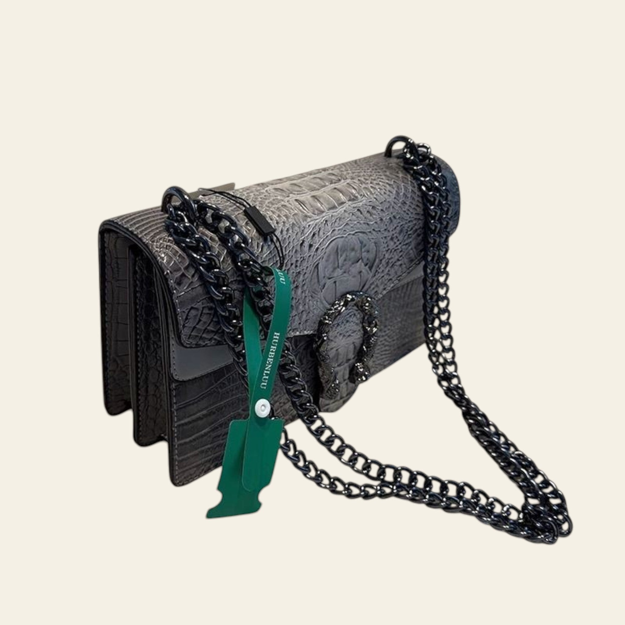 Gray textured handbag with black chain strap on a white surface, with 'HURBENLIU' branding visible.