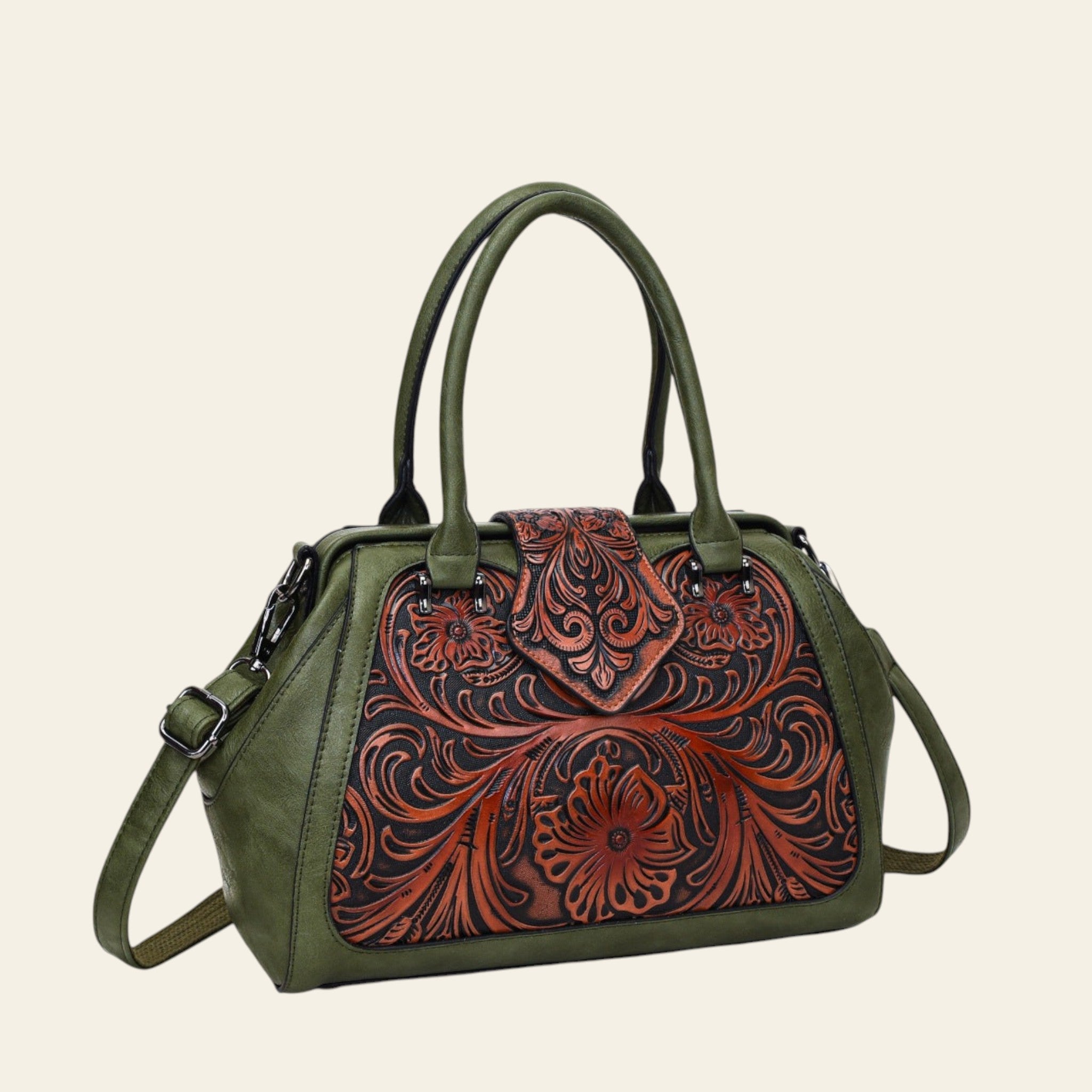 Green handbag with brown floral tooled leather design on a white background