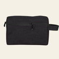 Black waist bag with a strap on a white background