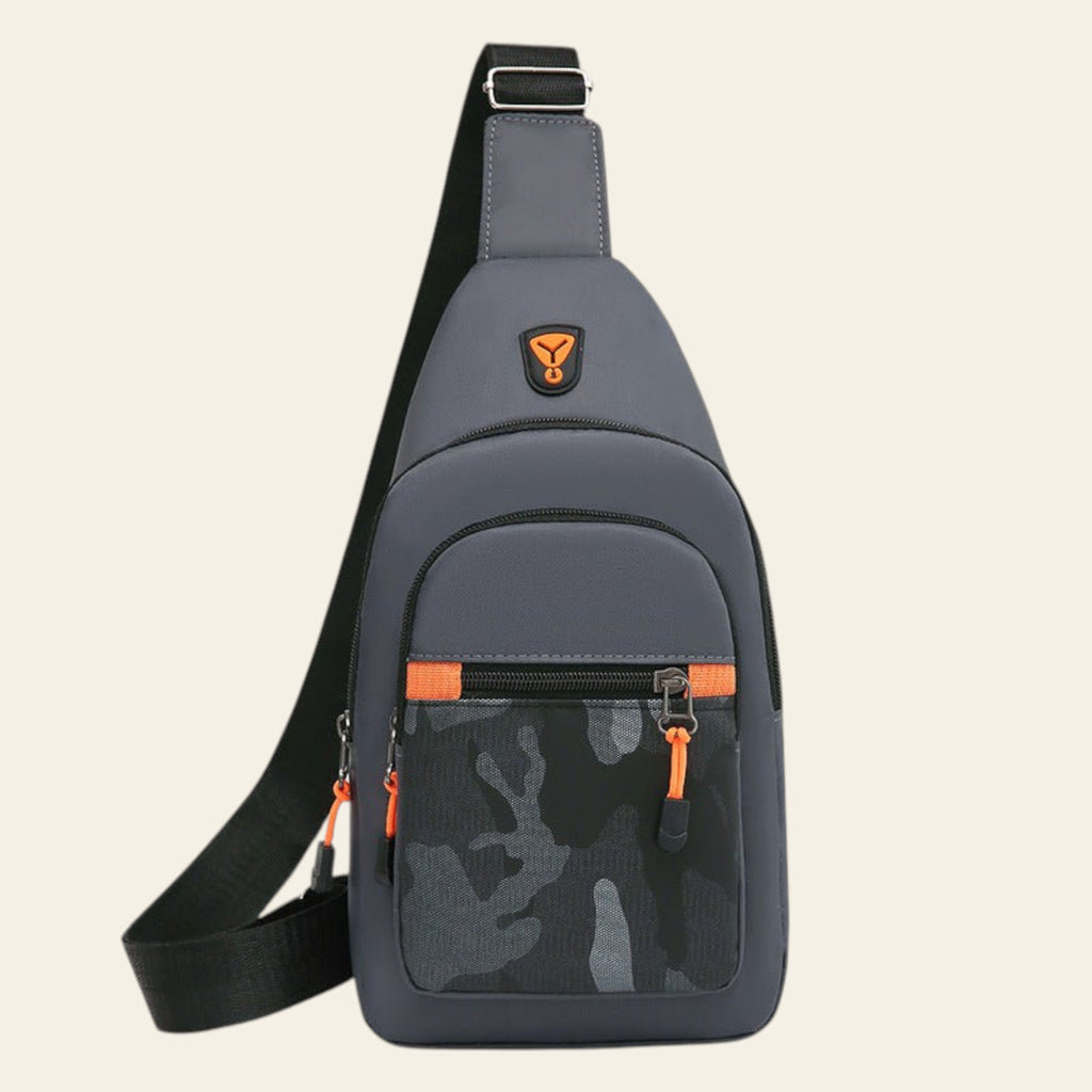 Gray sling bag with orange accents on a white background