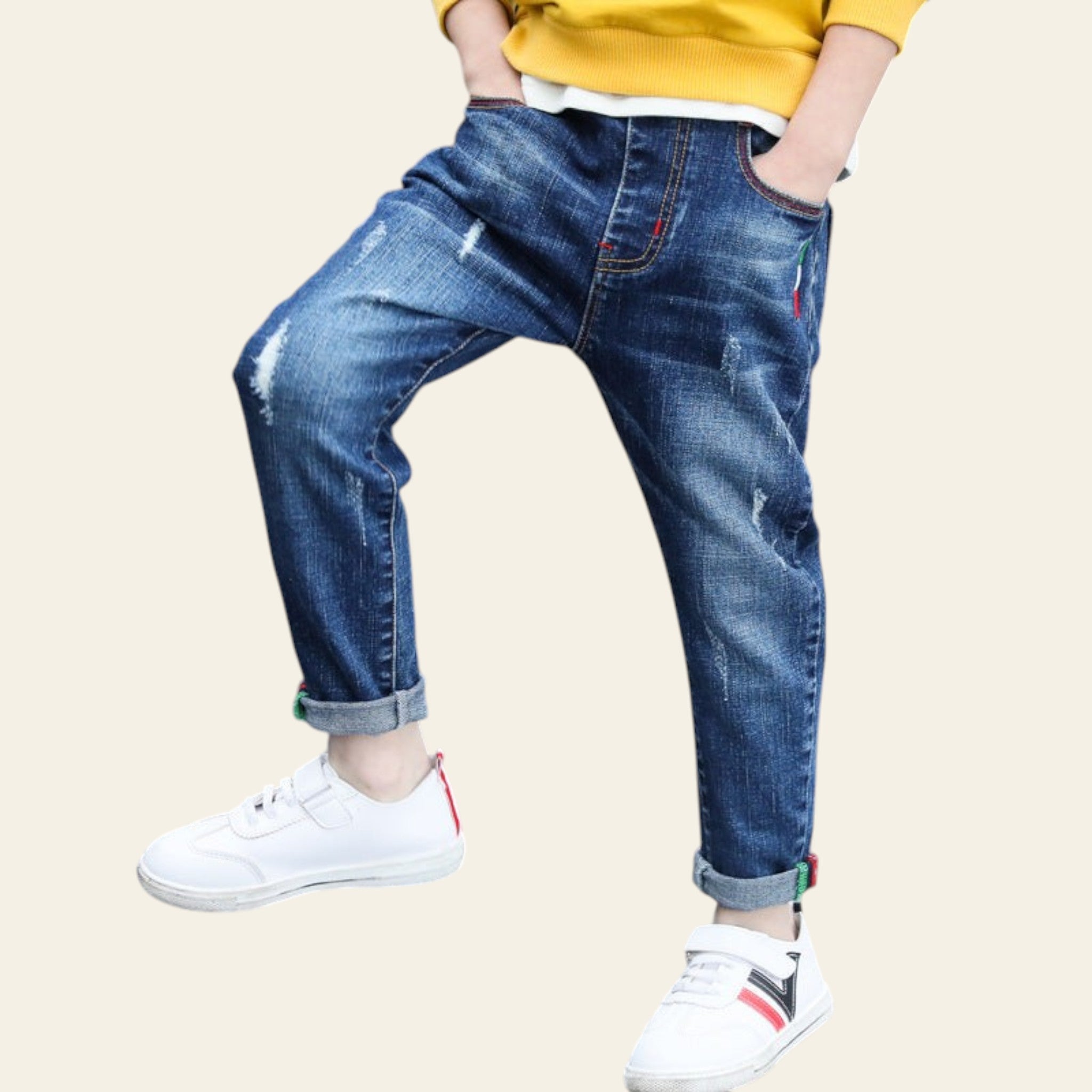 Person wearing blue jeans and white sneakers on a staircase, with 'e-hm' brand logo.