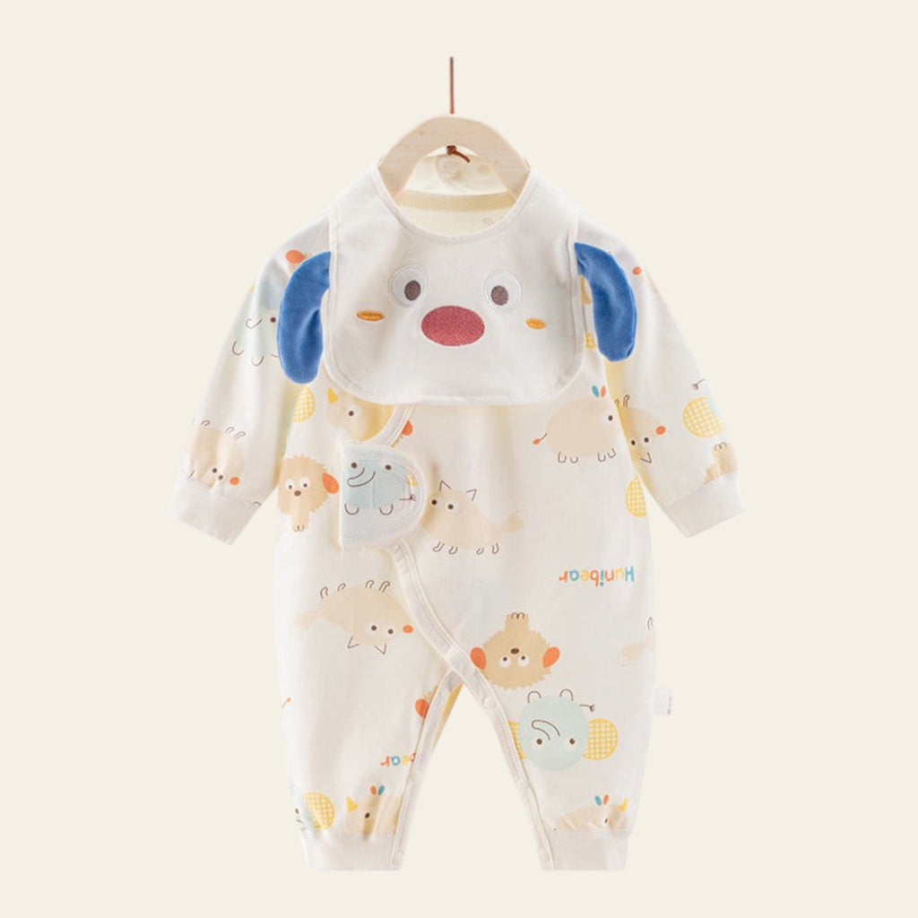 Baby onesie with cartoon dog design on a hanger against a white background