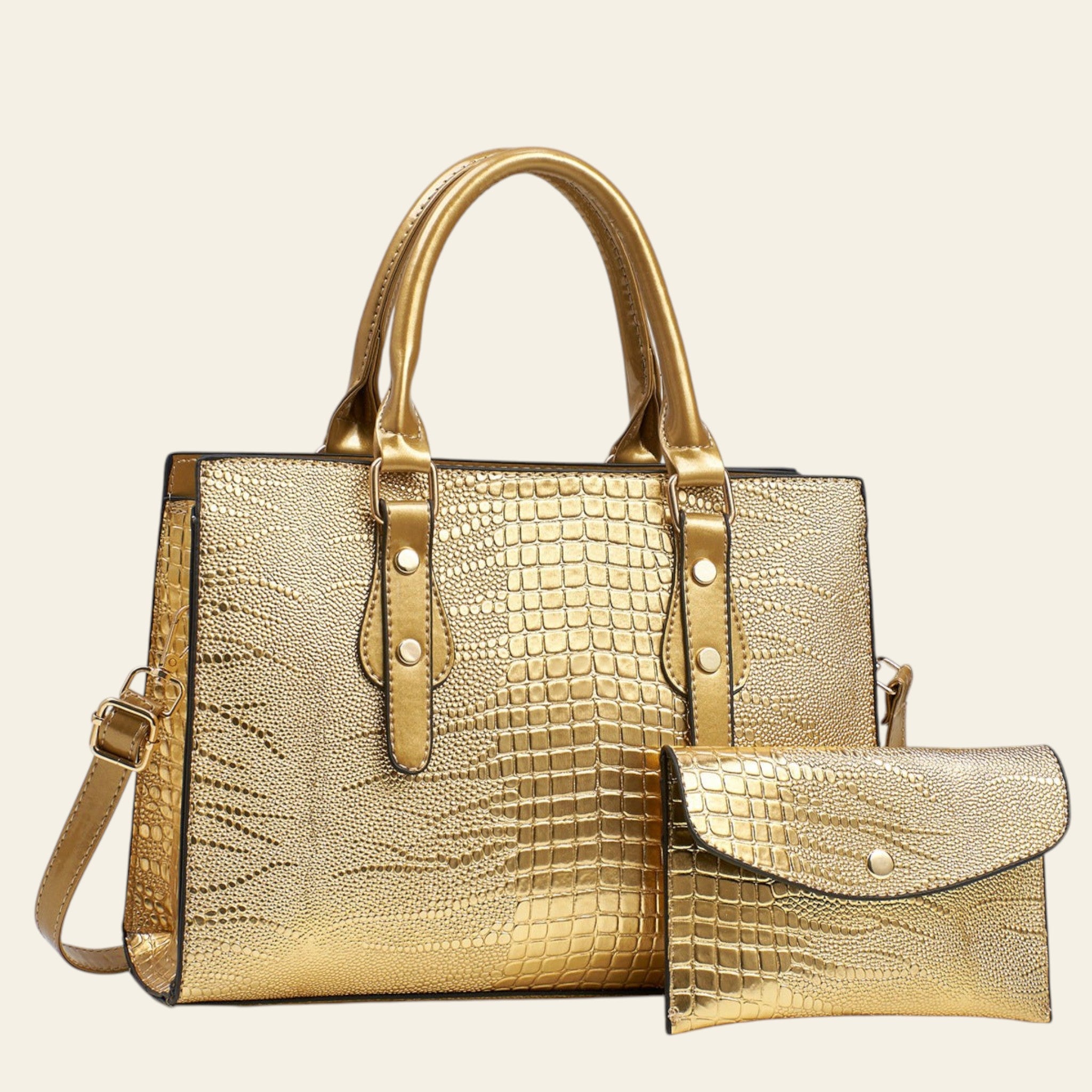 Gold crocodile-patterned handbag with matching pouch on a light gray background