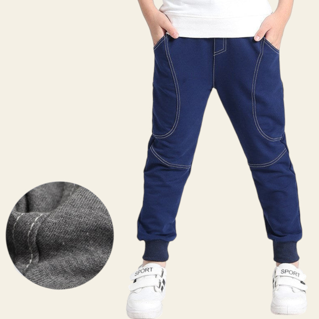 Blue pants with a close-up of fabric texture on a white background