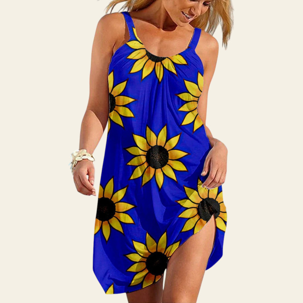 Woman wearing a blue sleeveless dress with yellow sunflower print, summer casual style