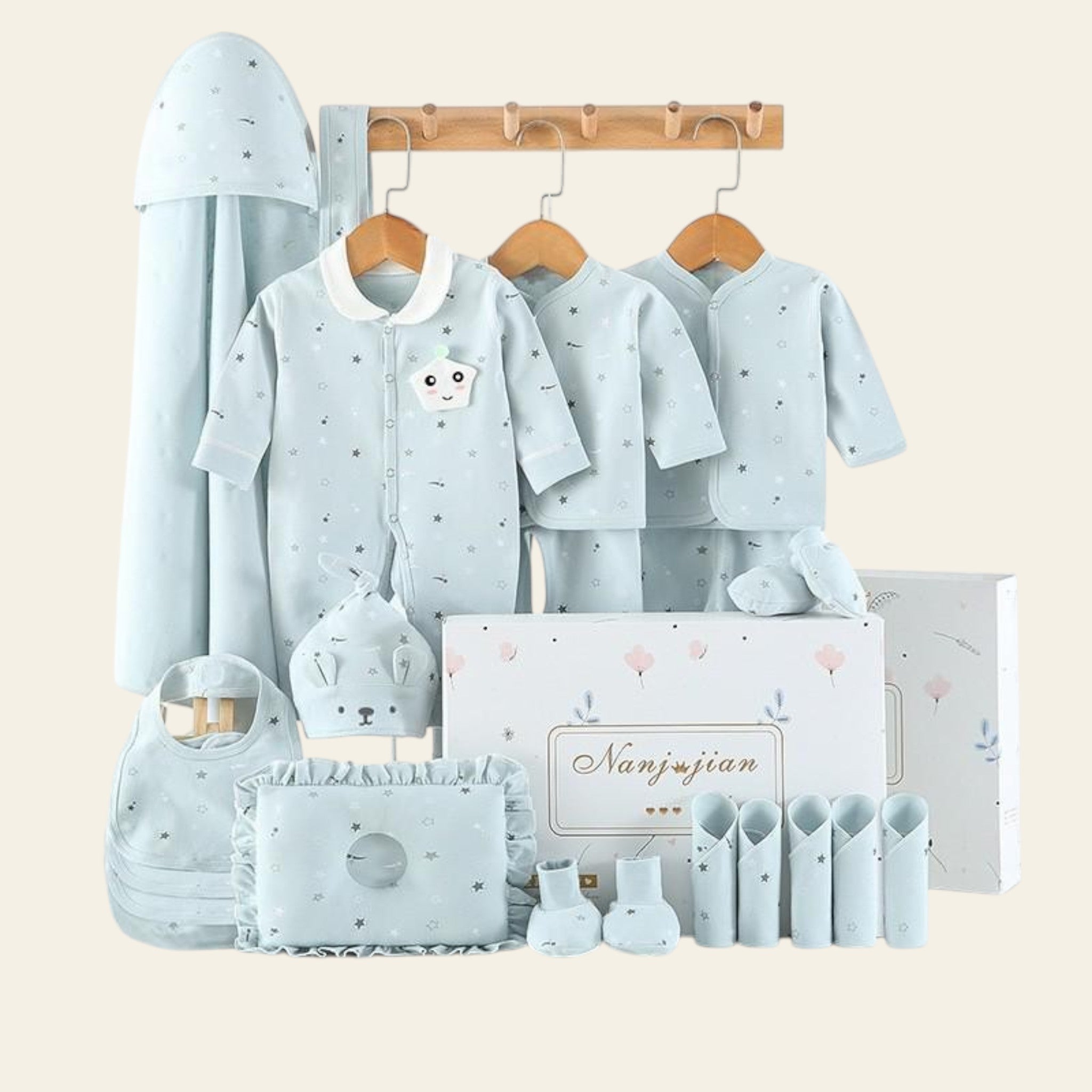 Baby clothing and accessories set with 'Nanjujian' branding on a white background