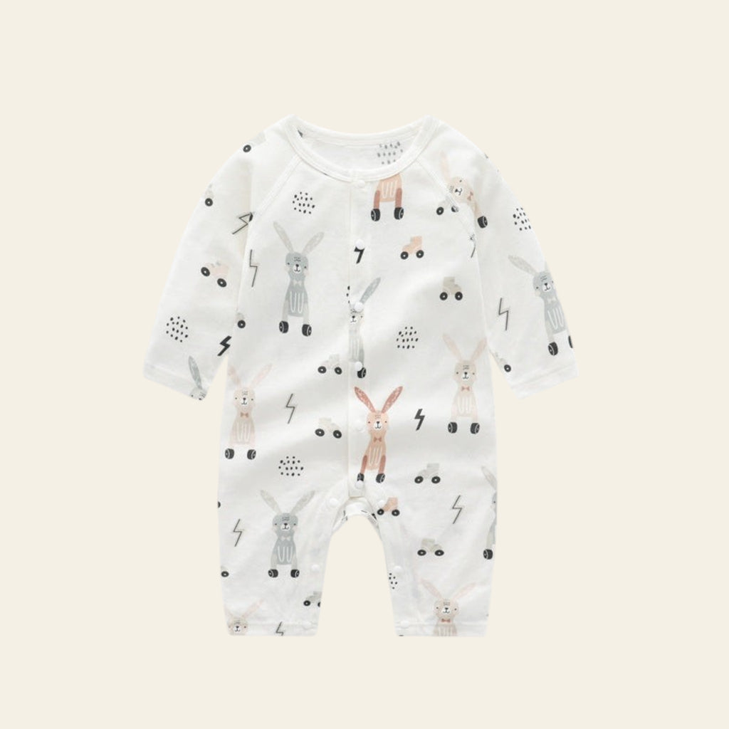 Baby onesie with animal print on a white background