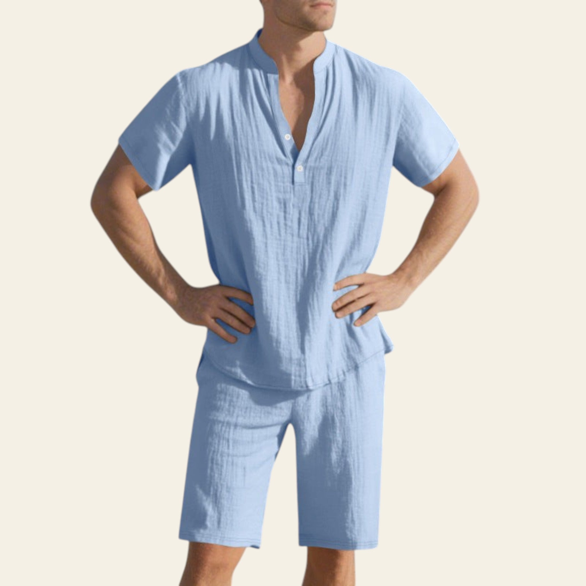 Man wearing a light blue linen summer outfit outdoors