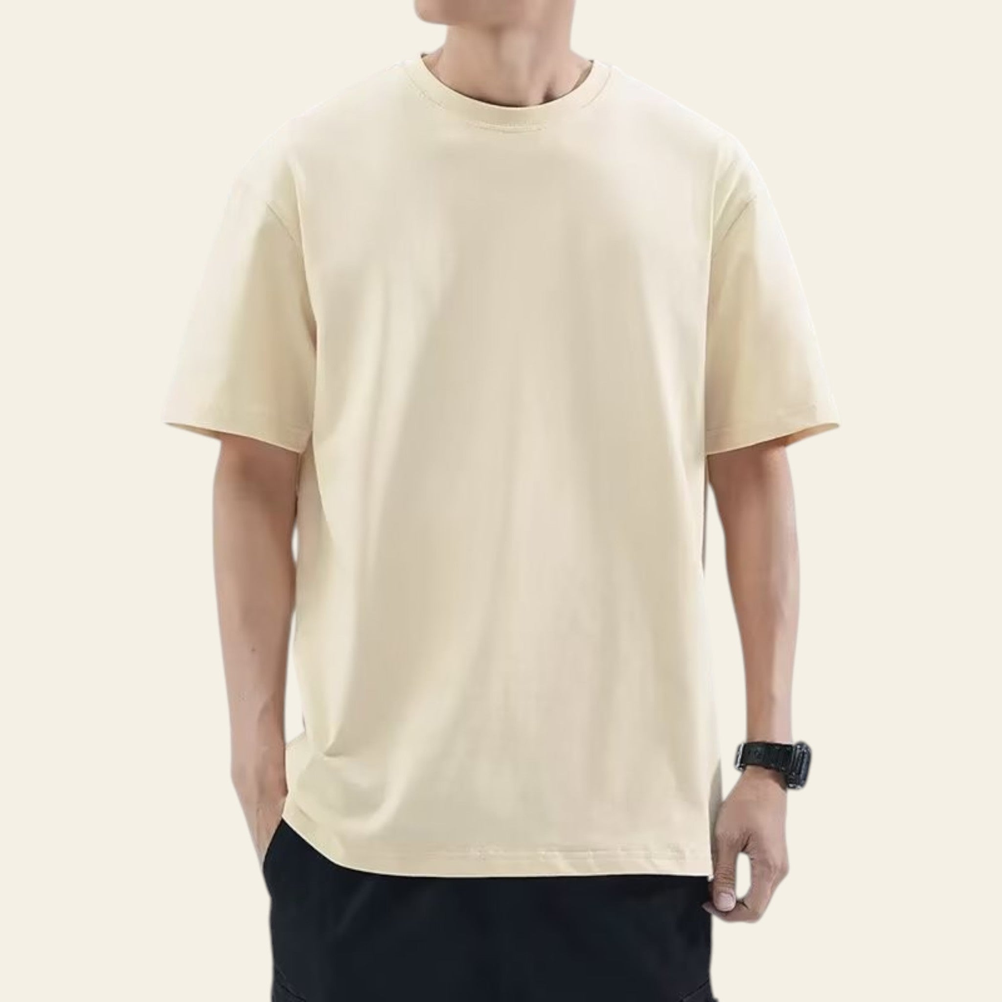 Man wearing an apricot loose fit solid color t-shirt
