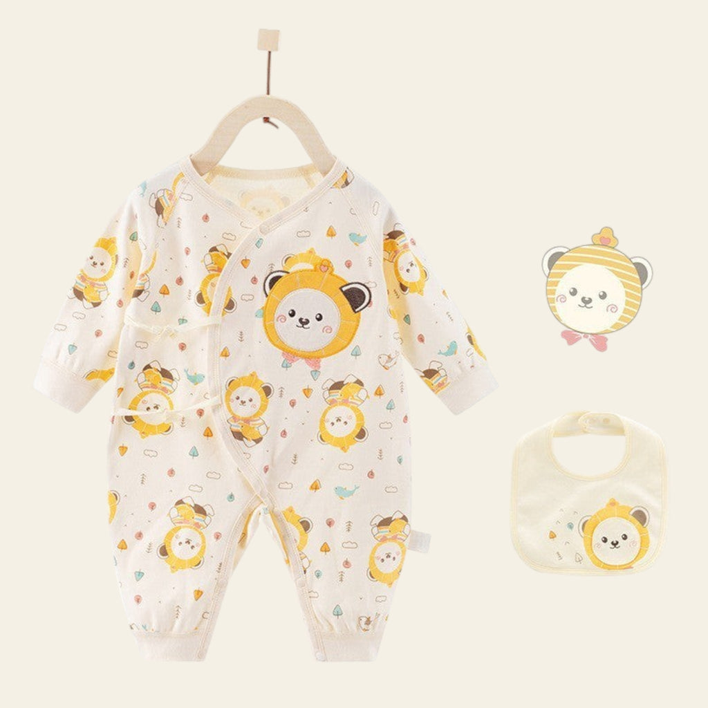 Baby romper with lion pattern and matching bib on a white background