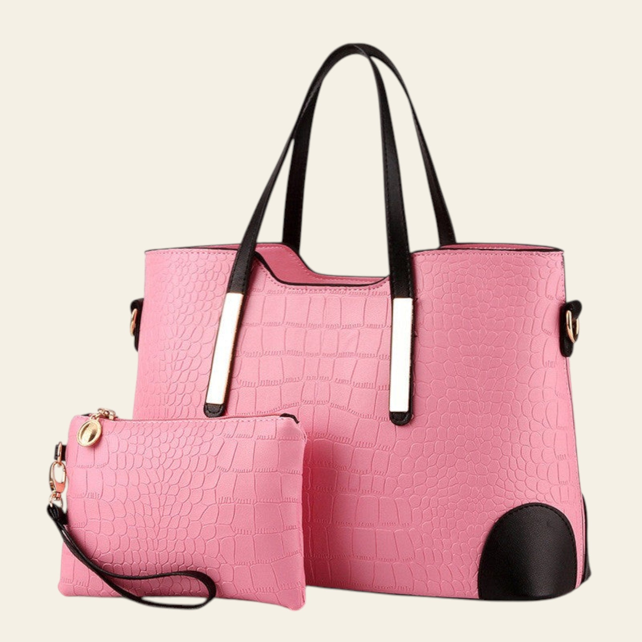 Pink handbag with black accents on a white background