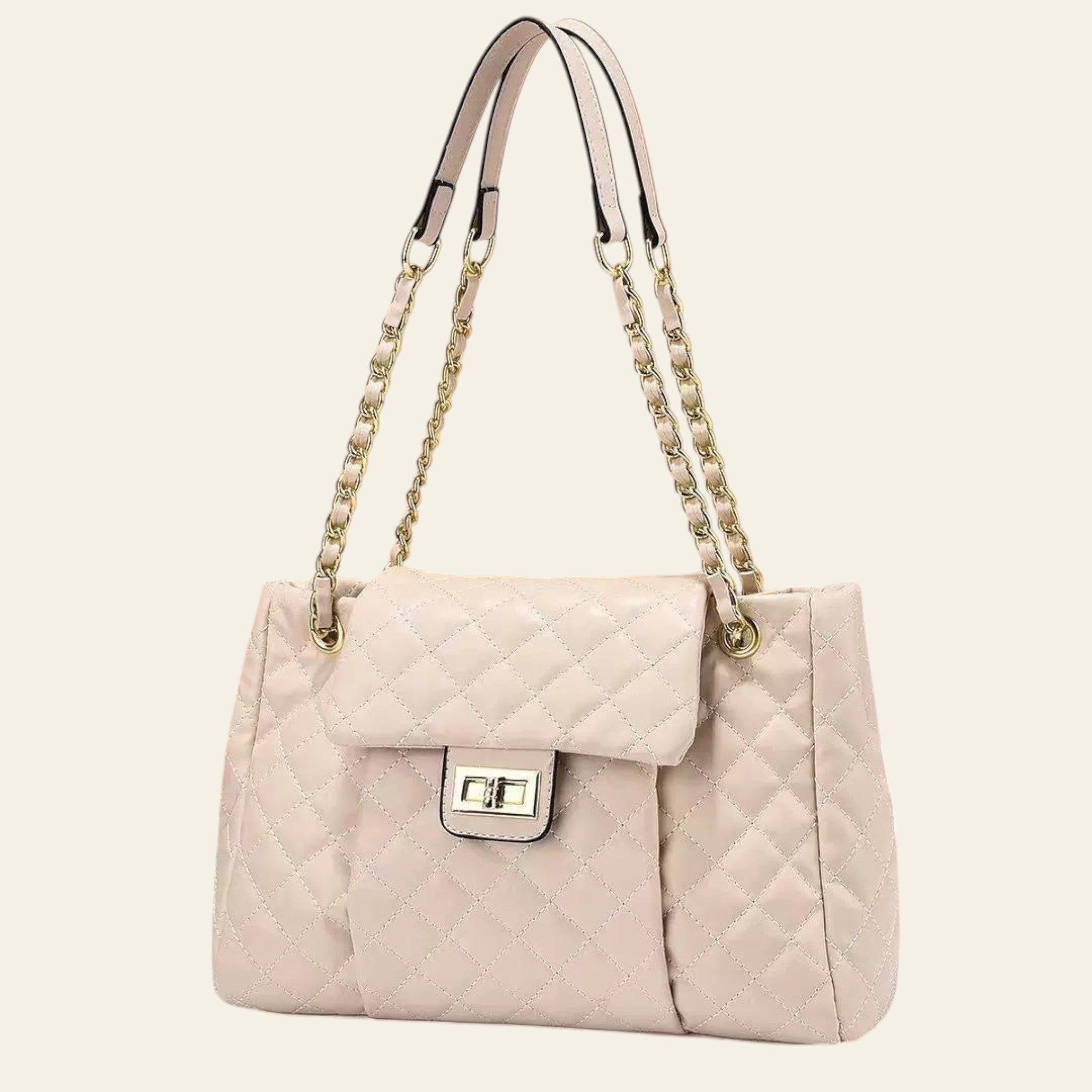 Quilted beige handbag with chain strap on a beige background
