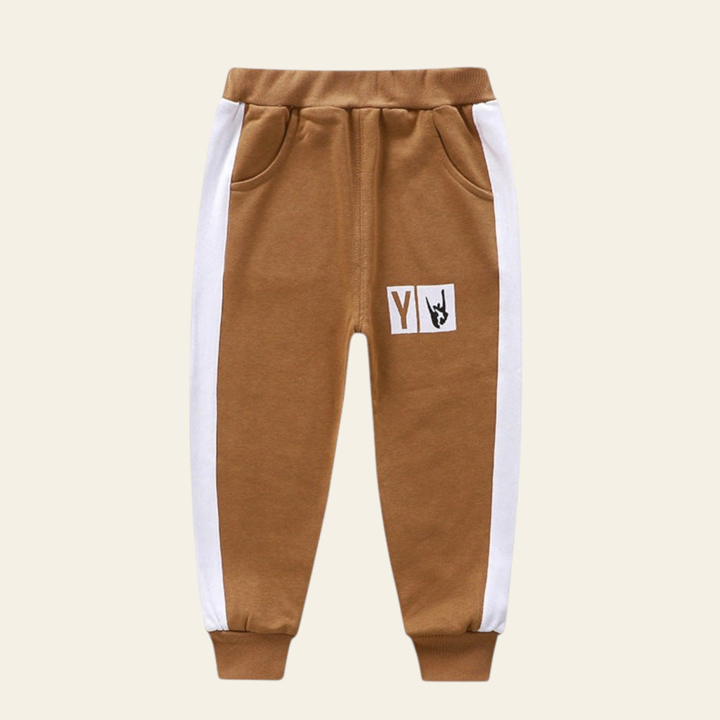 Brown sweatpants with white stripes on a white background