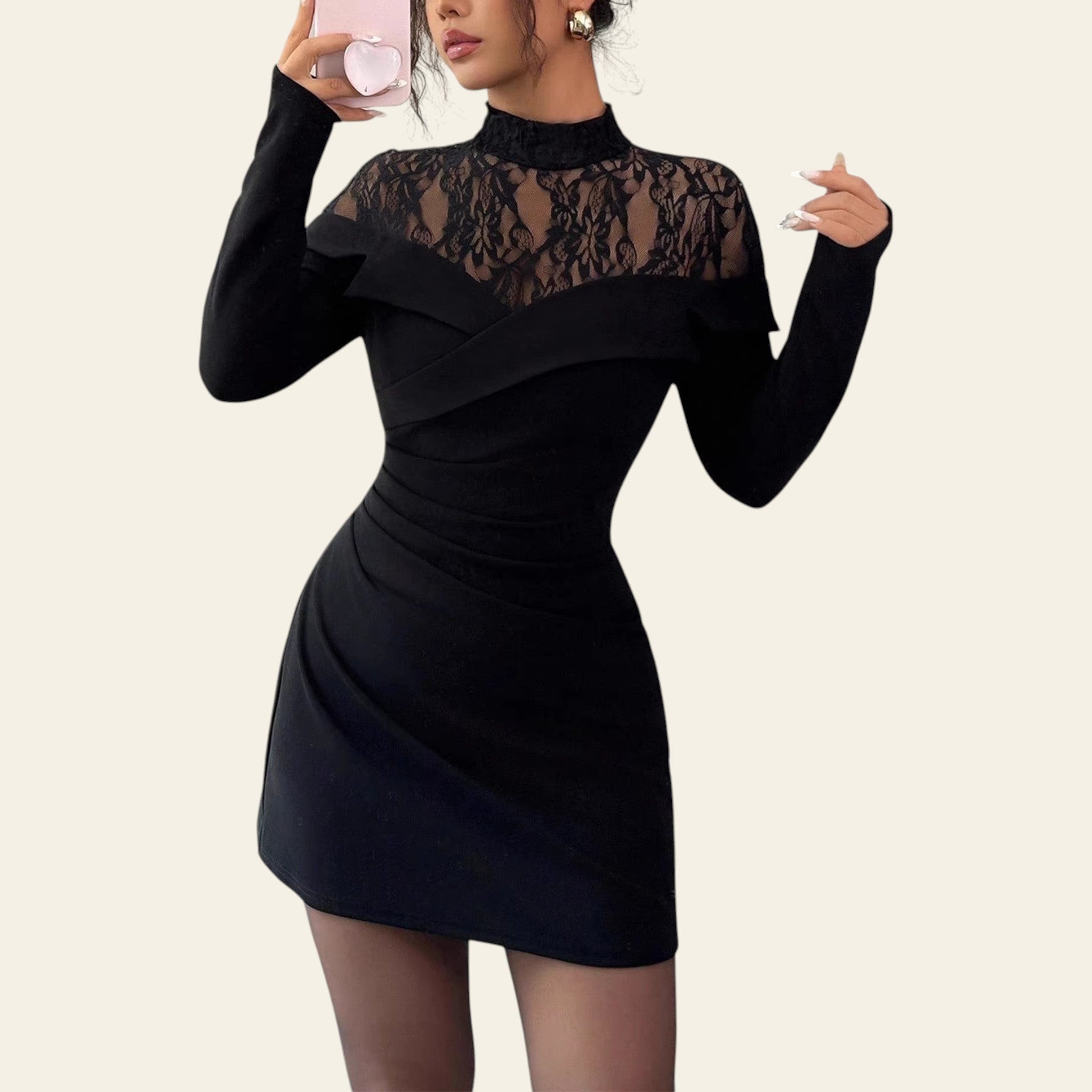 Woman wearing a black lace bodycon dress with long sleeves and elegant fit