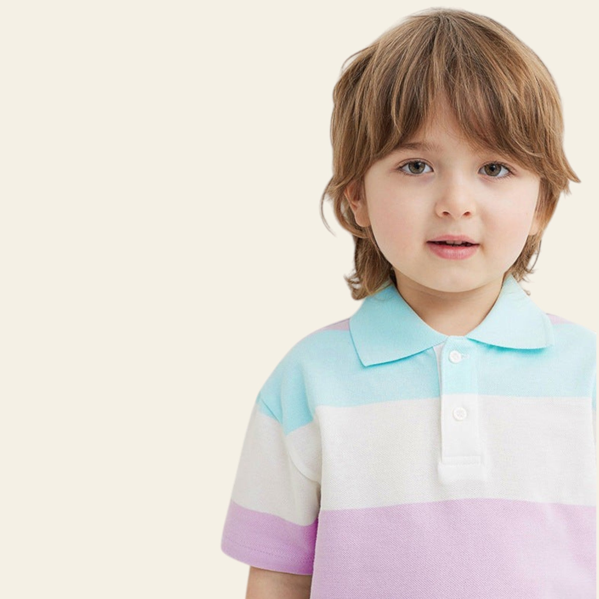 Child wearing a pastel striped polo shirt against a light background