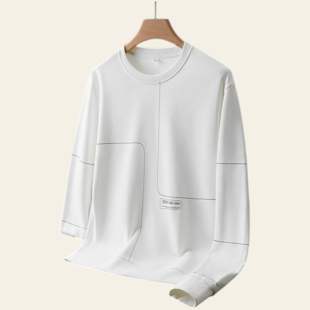 White crewneck pullover sweatshirt on a hanger against a gray background