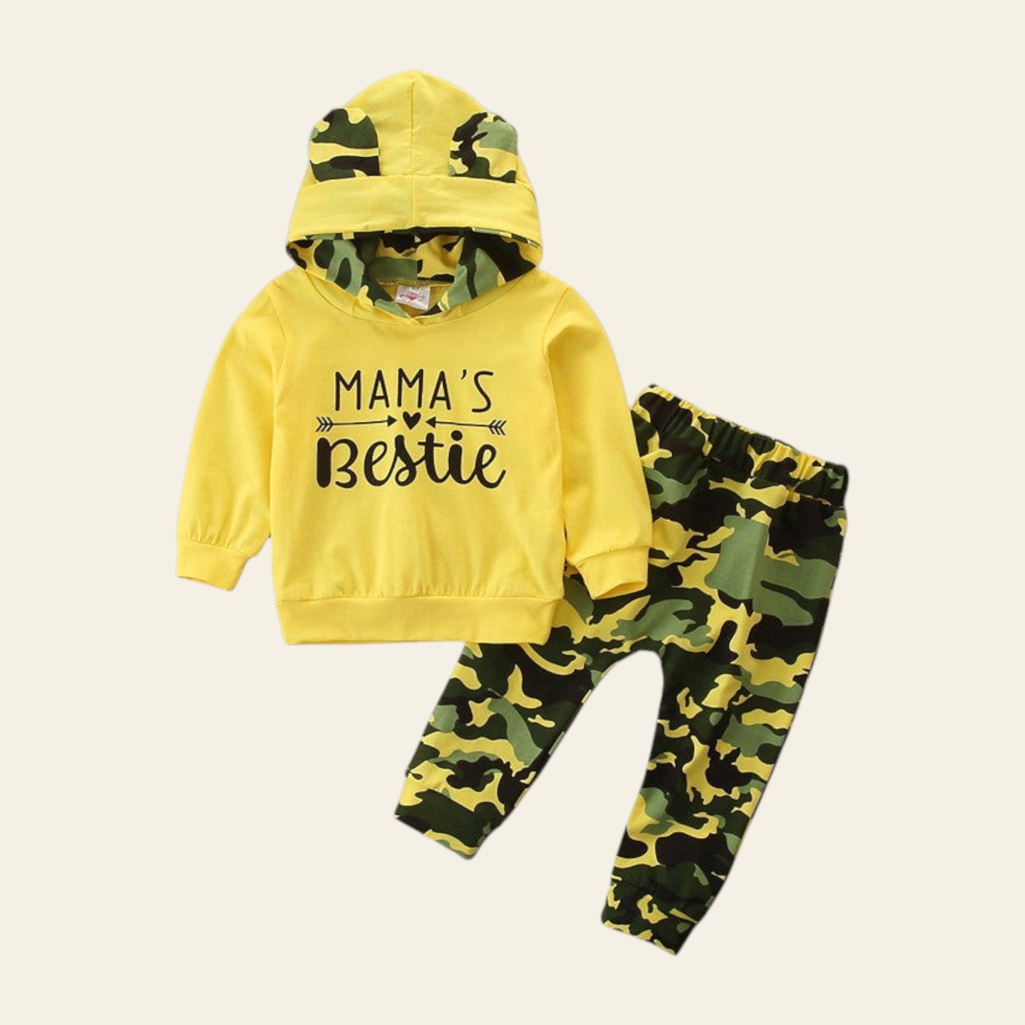 Yellow hoodie with 'Mama's Bestie' text and camouflage pants on a white background